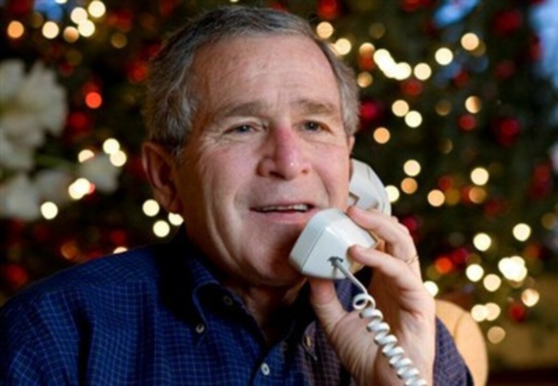 President George W. Bush makes Christmas Eve telephone calls to members of the Armed Forces who are stationed overseas, or who have recently returned from overseas locations, from Camp David, Md., Dec. 24, 2006. 