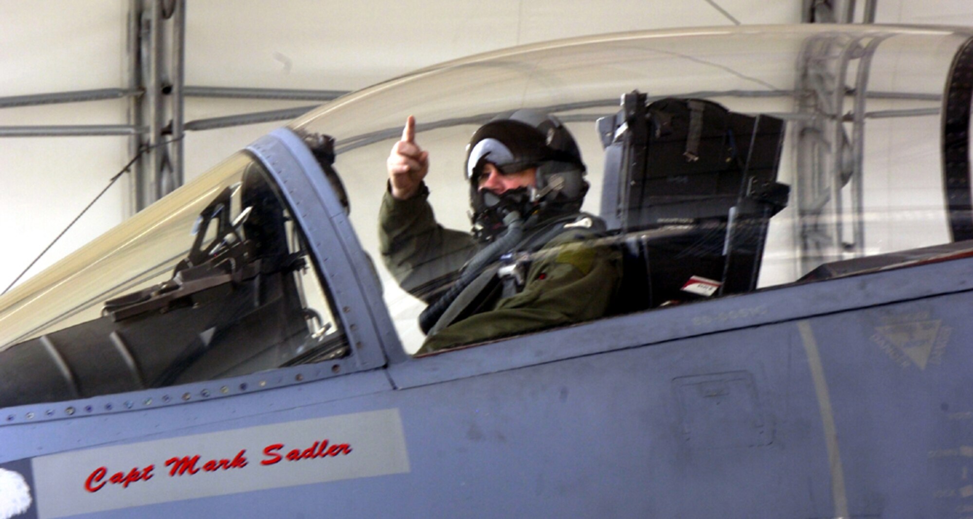 EGLIN AIR FORCE BASE, Fla. -- Lt. Col. Benjamin D. “Coma” Powell, 33d Fighter Wing inspector general, signals the crew chief that it’s time to taxi the aircraft from its parking spot for his final flight as a Nomad pilot Friday. Colonel Powell performed the duties of chief of wing inspections and exercises and later became the wing’s inspector general while assigned here. (U.S. Air Force photo/ Staff Sgt. Phillip O. Butterfield)