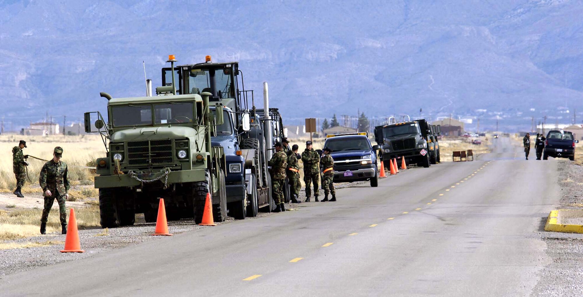 Airmen from Holloman Air Force Base, N.M., prepare to convoy to the alternate landing site Dec. 22 in support of the possible landing there of the Space Shuttle Discovery.  The shuttle was able to land safely at Kennedy Space Center, Fla., however, bringing the shuttle's mission to a successful end.  Airmen from Holloman are ready to support all NASA missions by training numerous times a year for such an event. (U.S. Air Force photo/Airman Michael Means) 