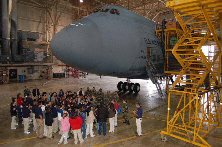 Students got to see first hand what goes into a full inspection and repair for one of the 433rd Airlift Wing's C-5 Galaxy Aircraft inside a hangar.