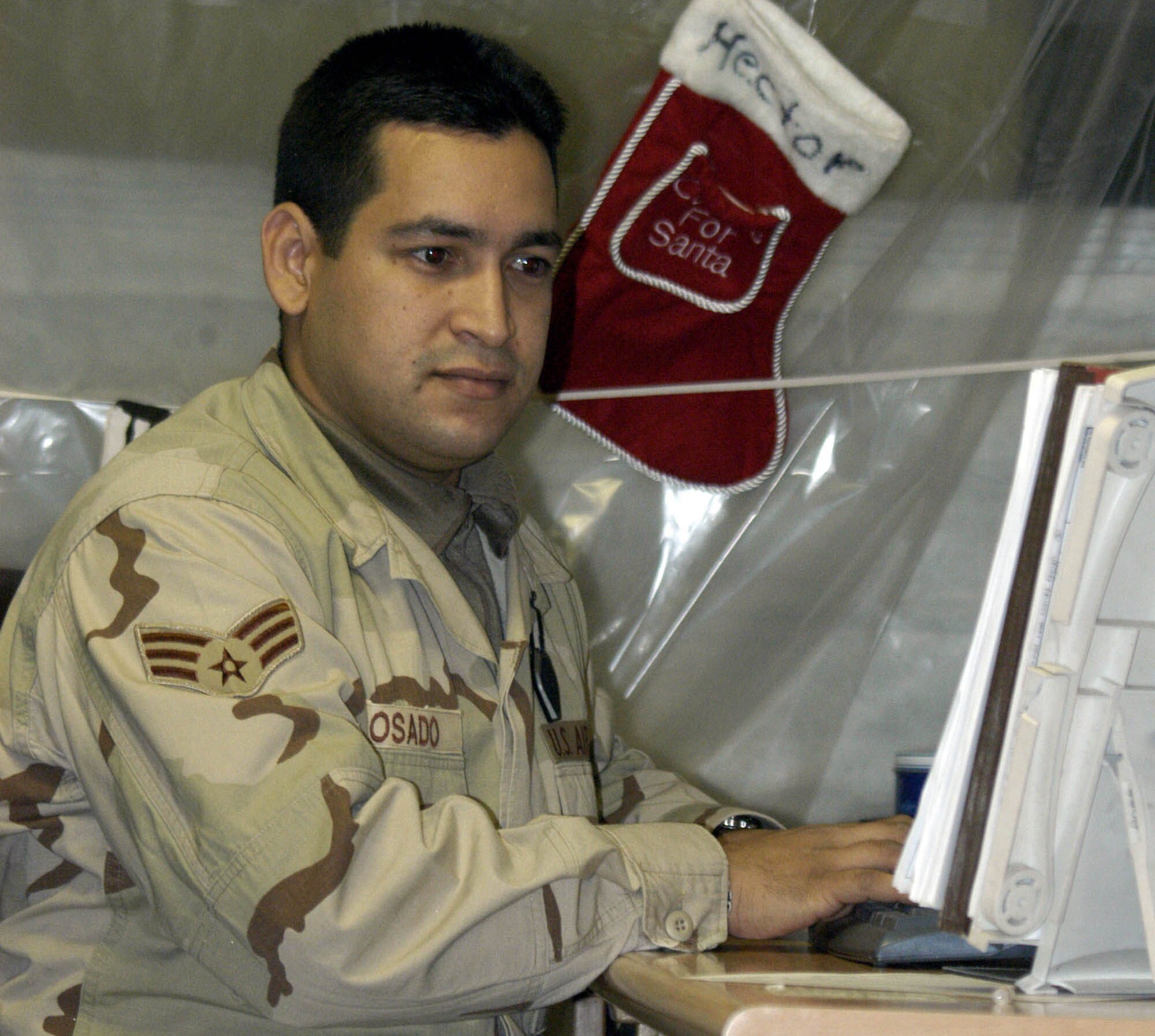 Senior Airman Hector Rosado is an airlift resource manager for the 774th Expeditionary Airlift Squadron at Bagram Air Base, Afghanistan. He is deployed from Muniz Air National Guard, Puerto Rico. (U.S. Air Force photo/Capt. Vince King Jr.)  

