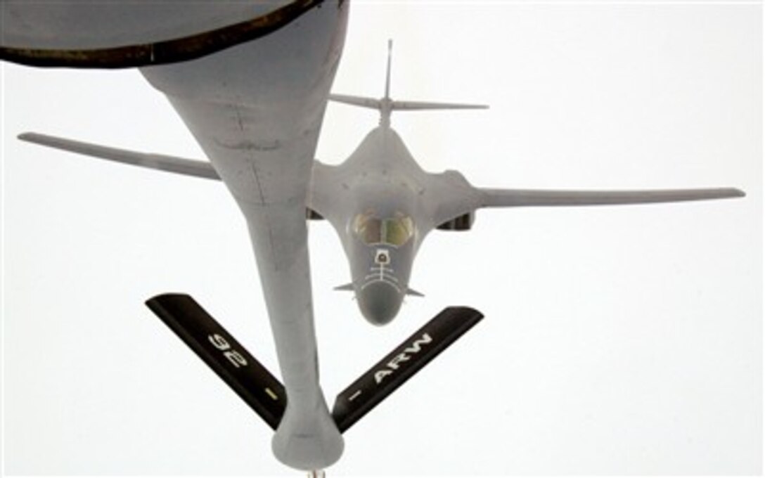 A B-1B Lancer approaches the boom of a KC-135 Stratotanker, assigned to the 22nd Expeditionary Air Refueling Squadron at Manas Air Base, Kyrgyzstan, Christmas Day for refueling. The bomber received 39,000 pounds of fuel to continue its mission over the Afghanistan area of responsibility.