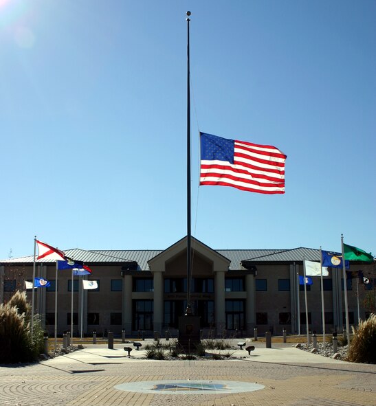 Blowing in the breeze, the flag outside the 47th Flying Training Wing headquarters hangs at half-staff in remembrance of President Gerald R. Ford, the thirty-eighth president of the United States. (U.S. Air Force photo by 2nd Lt. Courtney Kippenberger) 