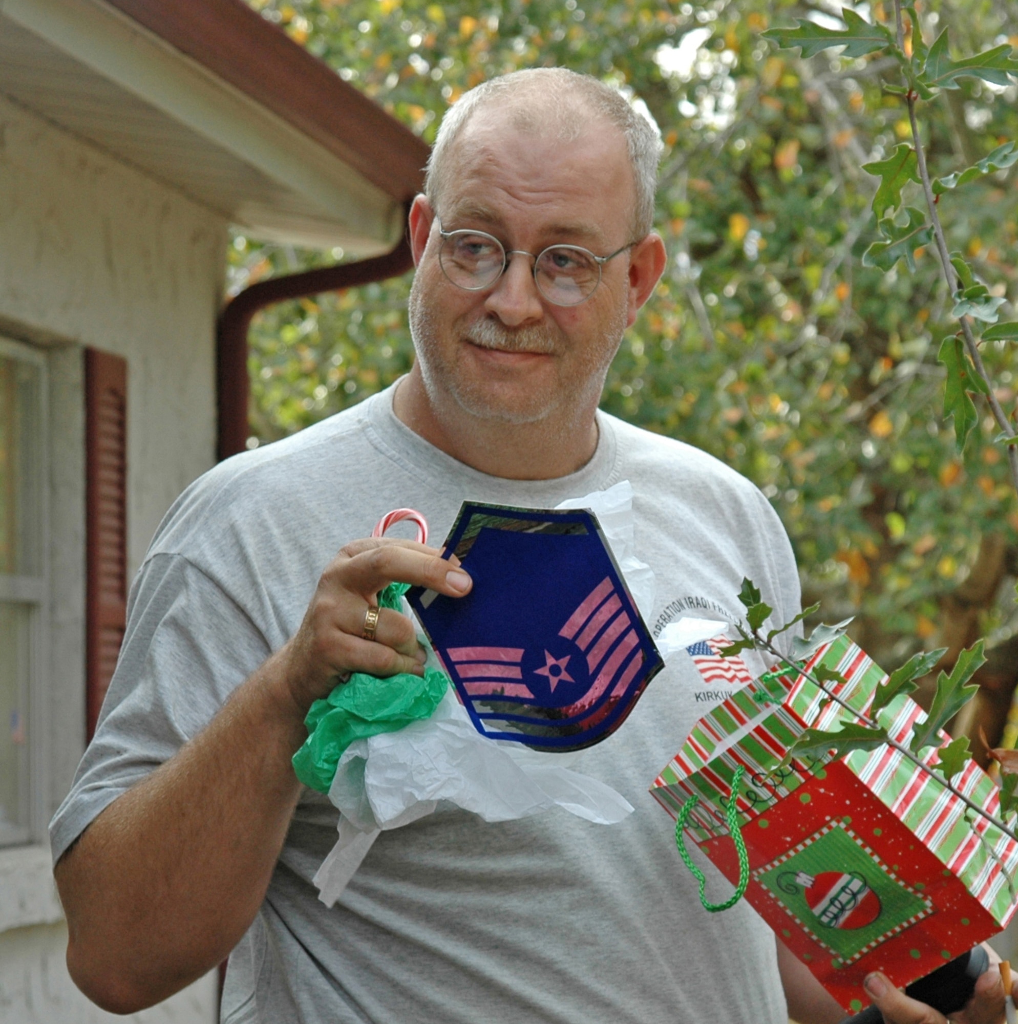 EGLIN AIR FORCE BASE, Fla. -- Tech. Sgt. Mike Wisenbaker, 33d Maintenance Squadron received master sergeant stripes Monday as a surprise Christmas present.  Col. Russ Handy, 33d Fighter Wing Commander presented Sergeant Wisenbaker the stripes at his home in Crestview, Fla. surprising him and his entire family with the immediate promotion and making Christmas day his current date of rank.

