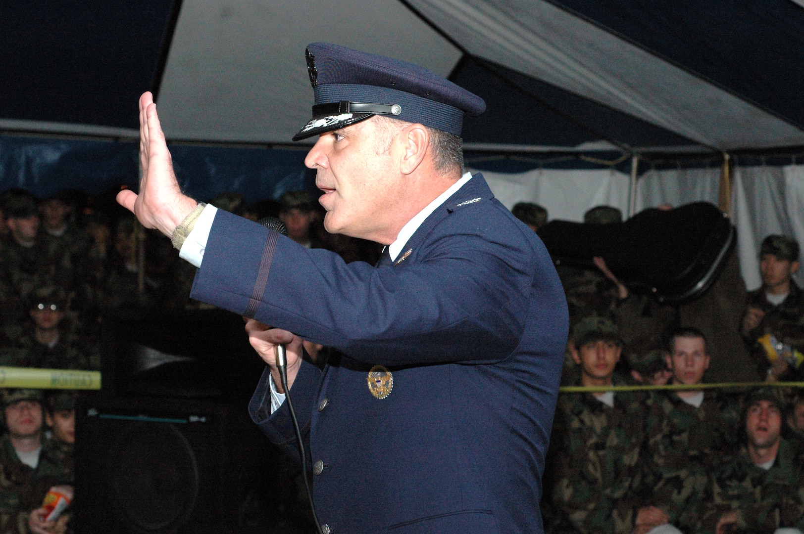 Col. Robert MacDonald, 737th Training Group commander, wishes the basic trainees at the Christmas Eve Extravaganza a happy and safe holiday at the start of the event on Dec. 24 at Lackland Air Force Base, Texas. (USAF photo by Staff Sgt. Tim Russer)