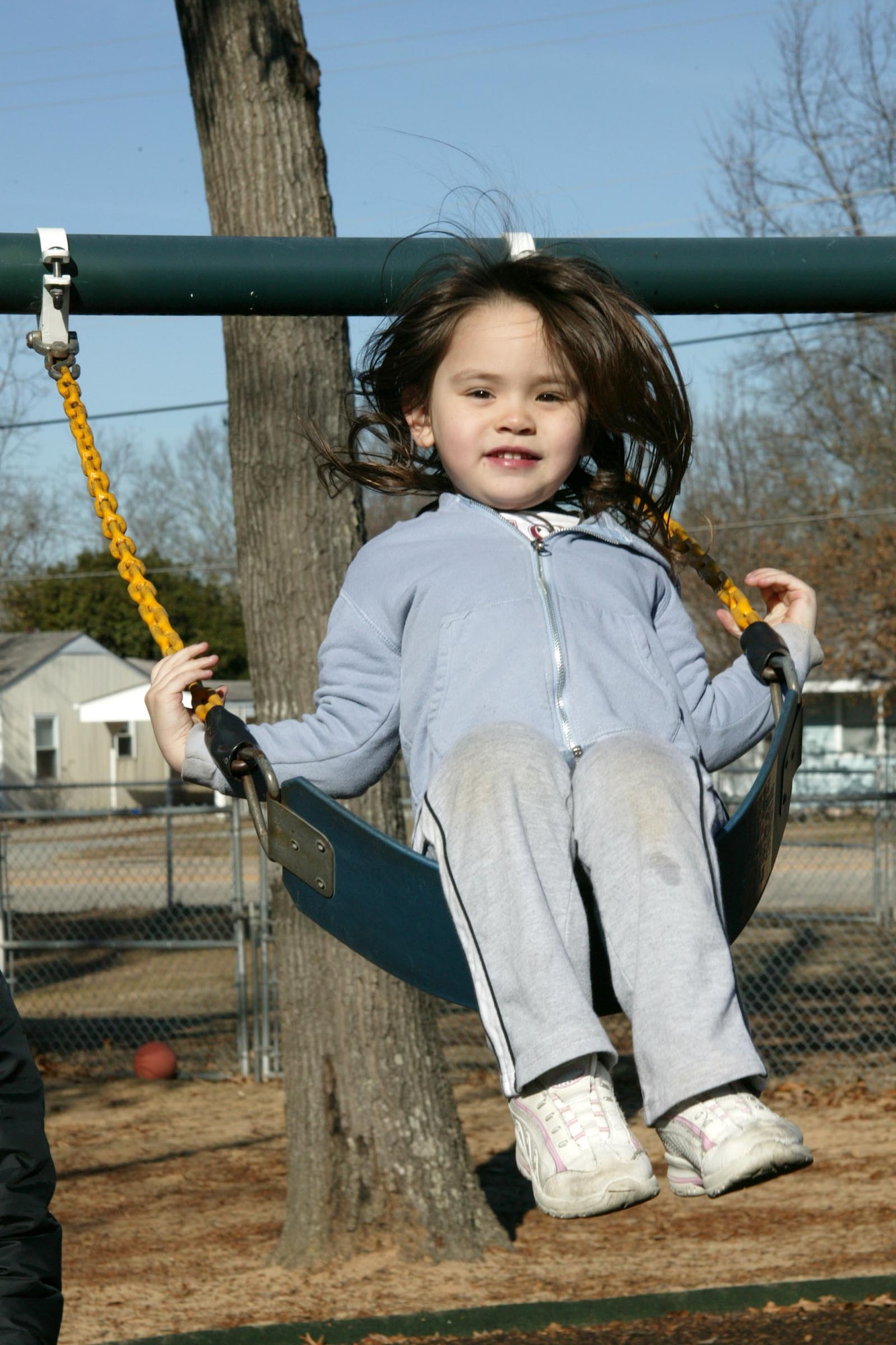 SHAW AIR FORCE BASE, S.C. -- Sara, daughter of Zachary Eskelson, of the 20th Aircraft Maintenance Squadron, enjoys the playgound Dec. 28 at the 20th Services Squadron Child Development Center. (U.S. Air Force photo/Tarsha Storey)