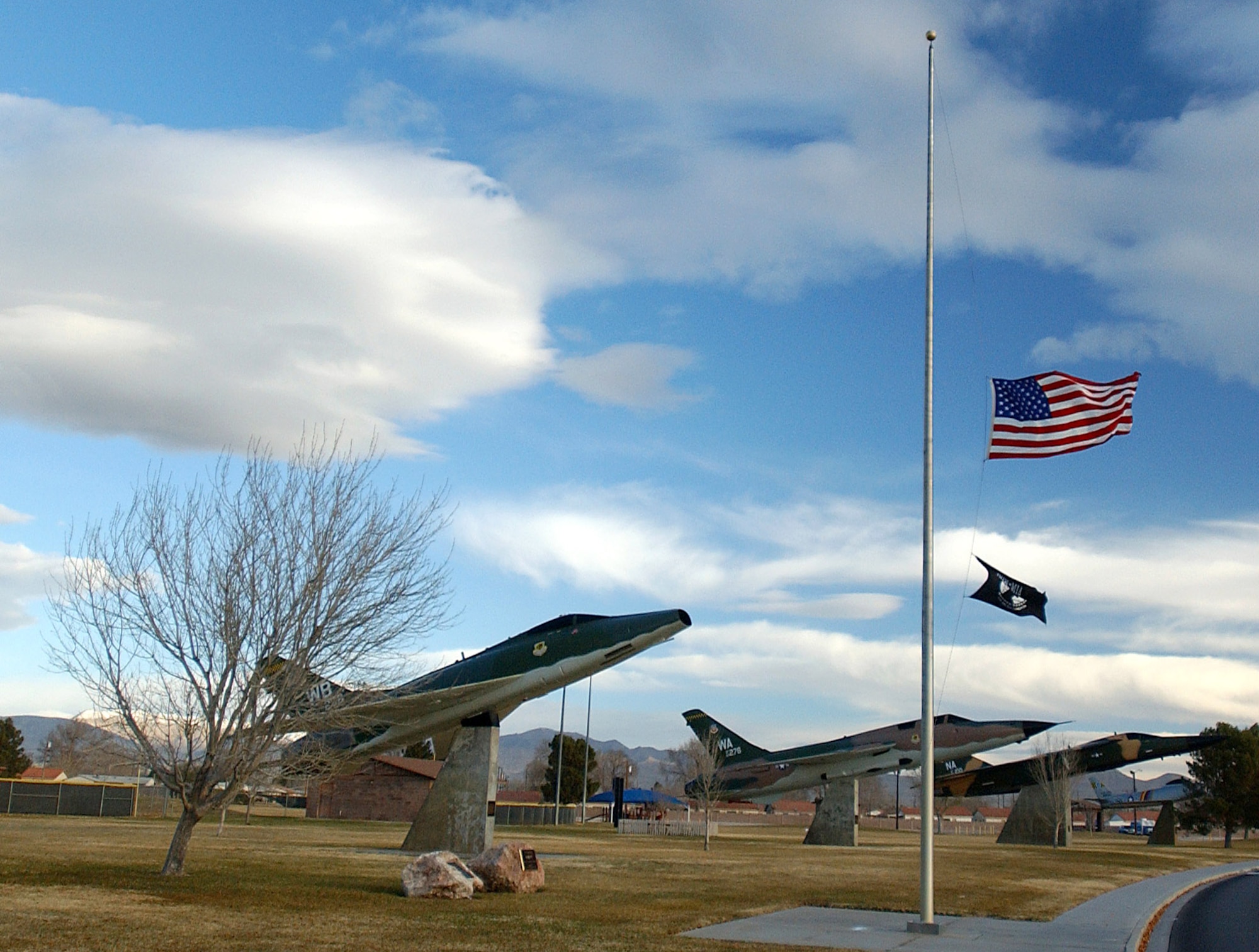 In honor of former President Gerald Ford, who passed away Dec. 26, an American flag flies at half staff Dec. 28 at Nellis Air Force Base, Nev. President Ford's final resting place will be on the grounds of the Gerald R. Ford Presidential Museum in Grand Rapids, Mich., the president's hometown. (U.S. Air Force photo/Staff Sgt. Jeremy Smith)