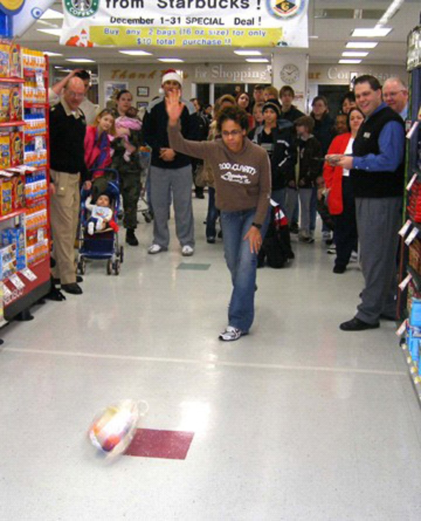 MISAWA AIR BASE, Japan --  A contestant participates in the 7th Annual Commissary Turkey Bowl Tuesday, Dec. 19. This year's contest was divided into two groups; kids and adults. The winners received a $25 shopping spree, while all participants received prizes.
