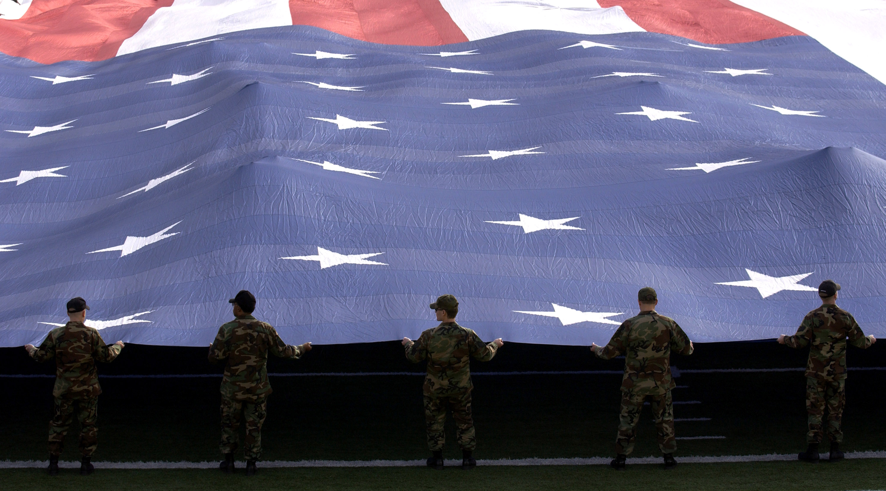 Airmen present the flag > Air Force > Article Display