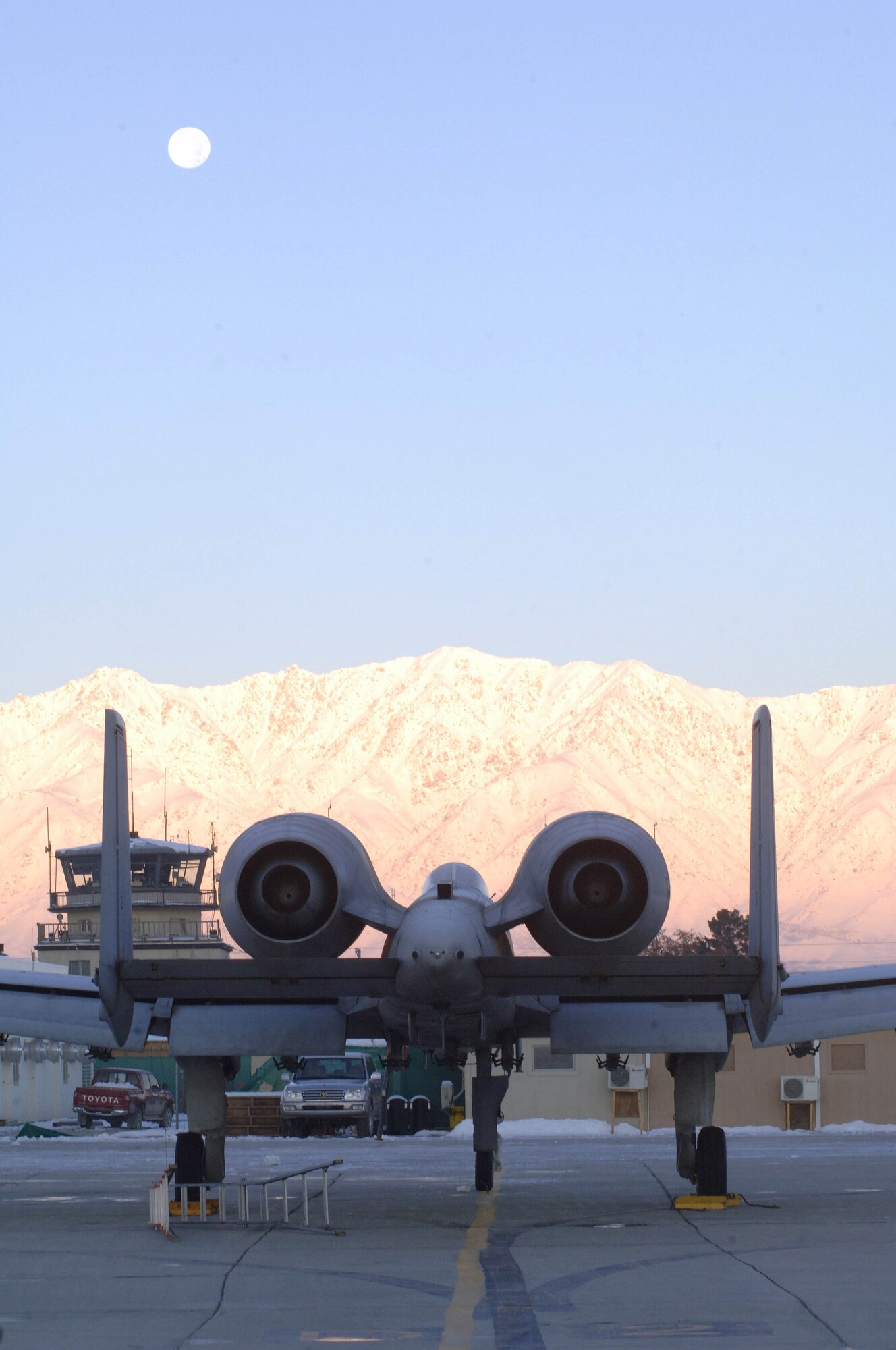 An A-10 Thunderbolt II, affectionately known as the "Warthog" to its pilots, sits ready for the day's mission at Bagram Airfield, Afghanistan, Dec. 28. The A-10 fighter squadrons assigned to Bagram have flown over 5,000 sorties this year, totaling more than 18,120 flying hours in support of Operation Enduring Freedom. (U.S. Air Force photo/Tech. Sgt. Joseph Kapinos)