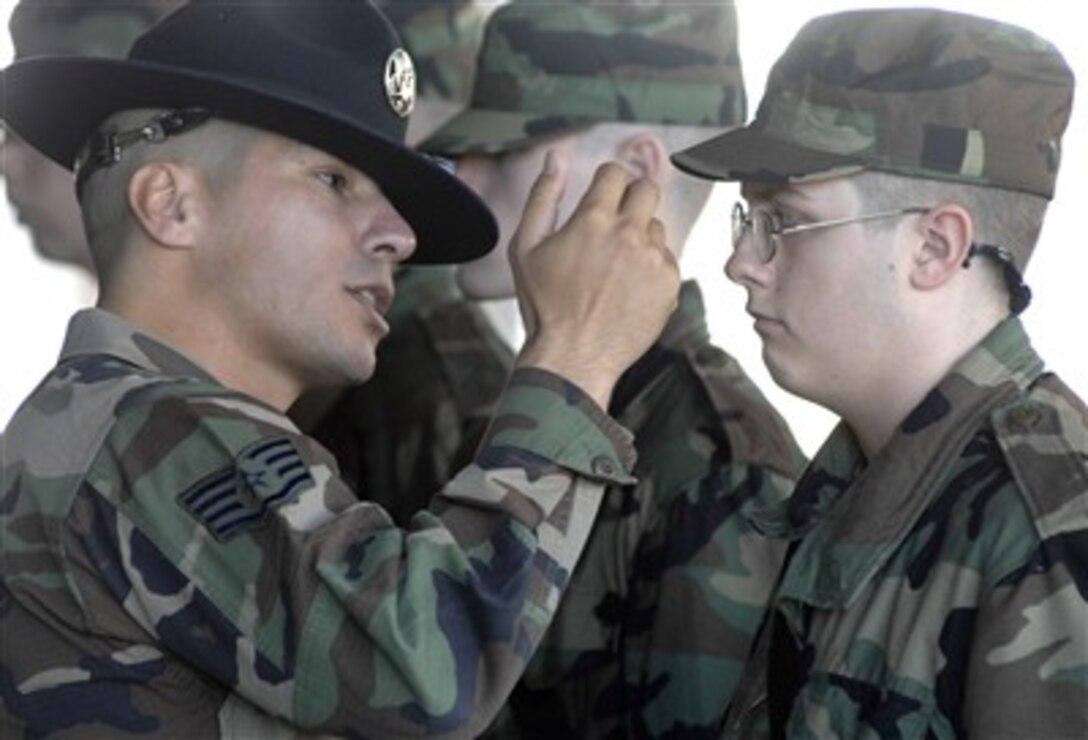 U.S. Air Force Staff Sgt. Jacob Chavez, military training instructor with the 322nd Training Squadron, corrects a trainee during a drill practice at Lackland Air Force Base, Texas, Dec. 27, 2006.
