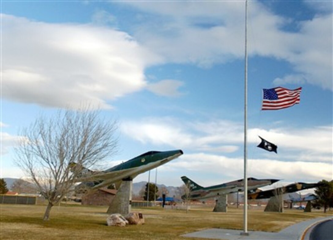 The U.S. flag flies at half staff at Nellis Air Force Base, Nev, Dec. 28, 2006 in honor of former President Gerald R. Ford who died Dec. 26.