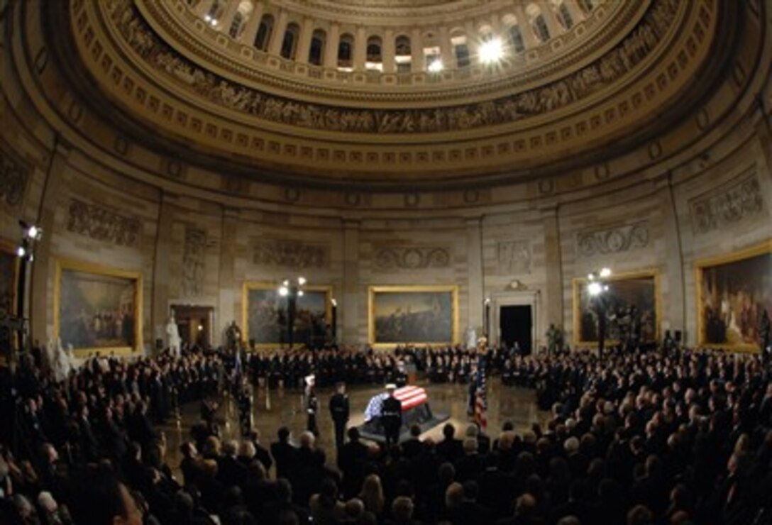 Vice President Richard Cheney along with members of the Senate and the House of Representatives honor former President Gerald R. Ford during national funeral ceremonies in the Rotunda of the U.S. Capitol in Washington, D.C., Dec. 30, 2006. 