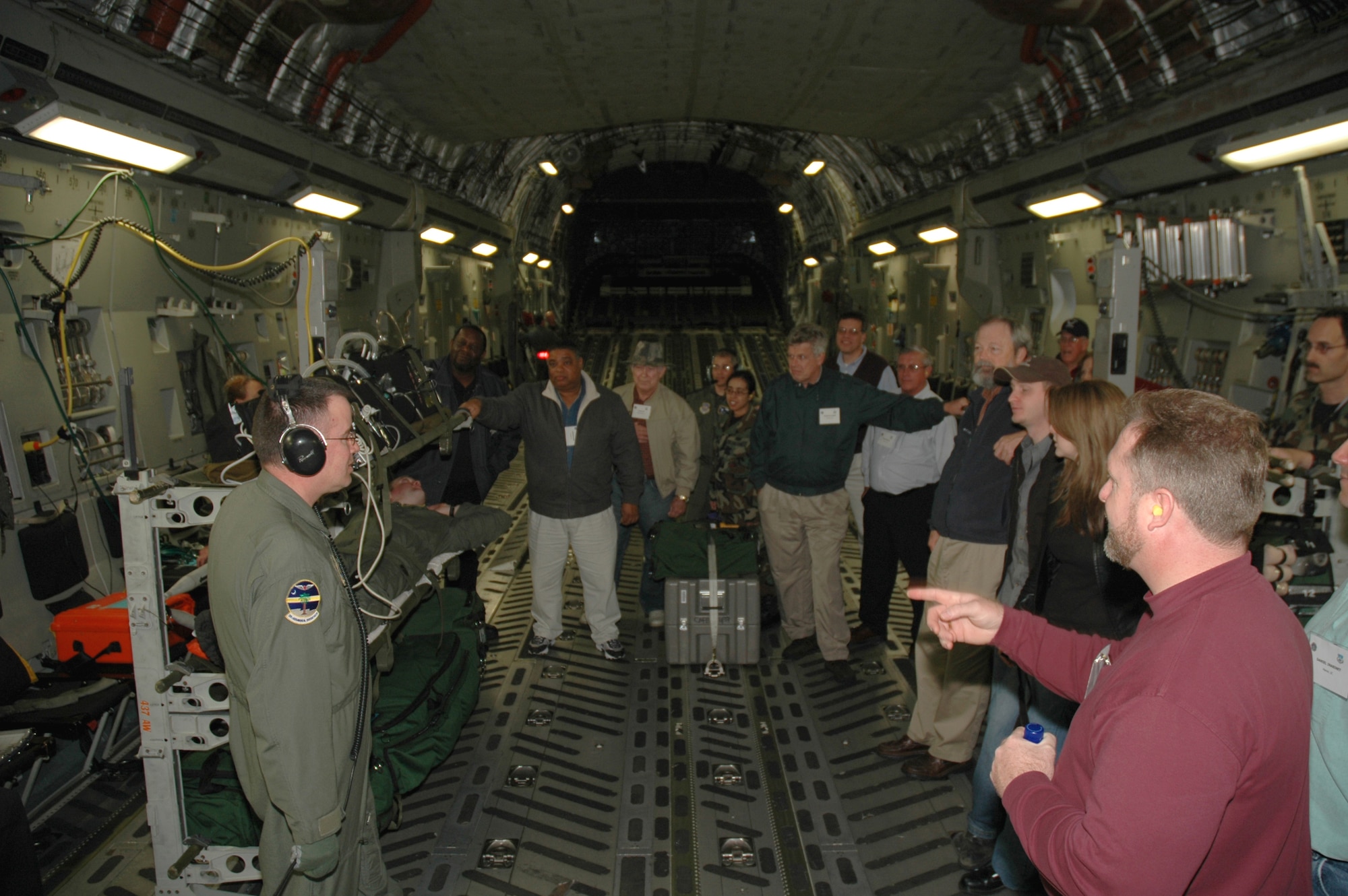 Members of the 315th Aeromedical Evacuation Squadron  give a demonstration to South Carolina pastors aboard a C-17 Globemaster III during the 315th Airlift Wing's clergy day. (Photo by 1st Lt. Wayne Capps, USAFR)