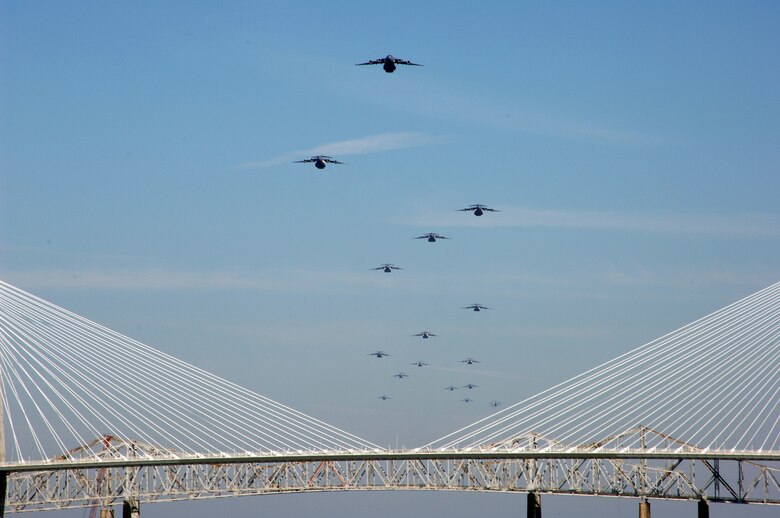 CHARLESTON, S.C. (AFPN) -- A formation of 17 C-17 Globemaster IIIs fly in formation.  This year's $1.3 billion military construction request, as part of the president's fiscal year 2007 budget plan, is the largest in the last 15 years and includes projects for new mission beddowns for the C-17 Globemaster III. The flight demonstrates the U.S. Air Force's strategic capability and is the largest formation of C-17s to take flight from a single base.  The C-17s are assigned to the 437th and 315th Airlift Wings at Charleston Air Force Base. (U.S. Air Force photo by Tech. Sgt. Richard T. Kaminsky)