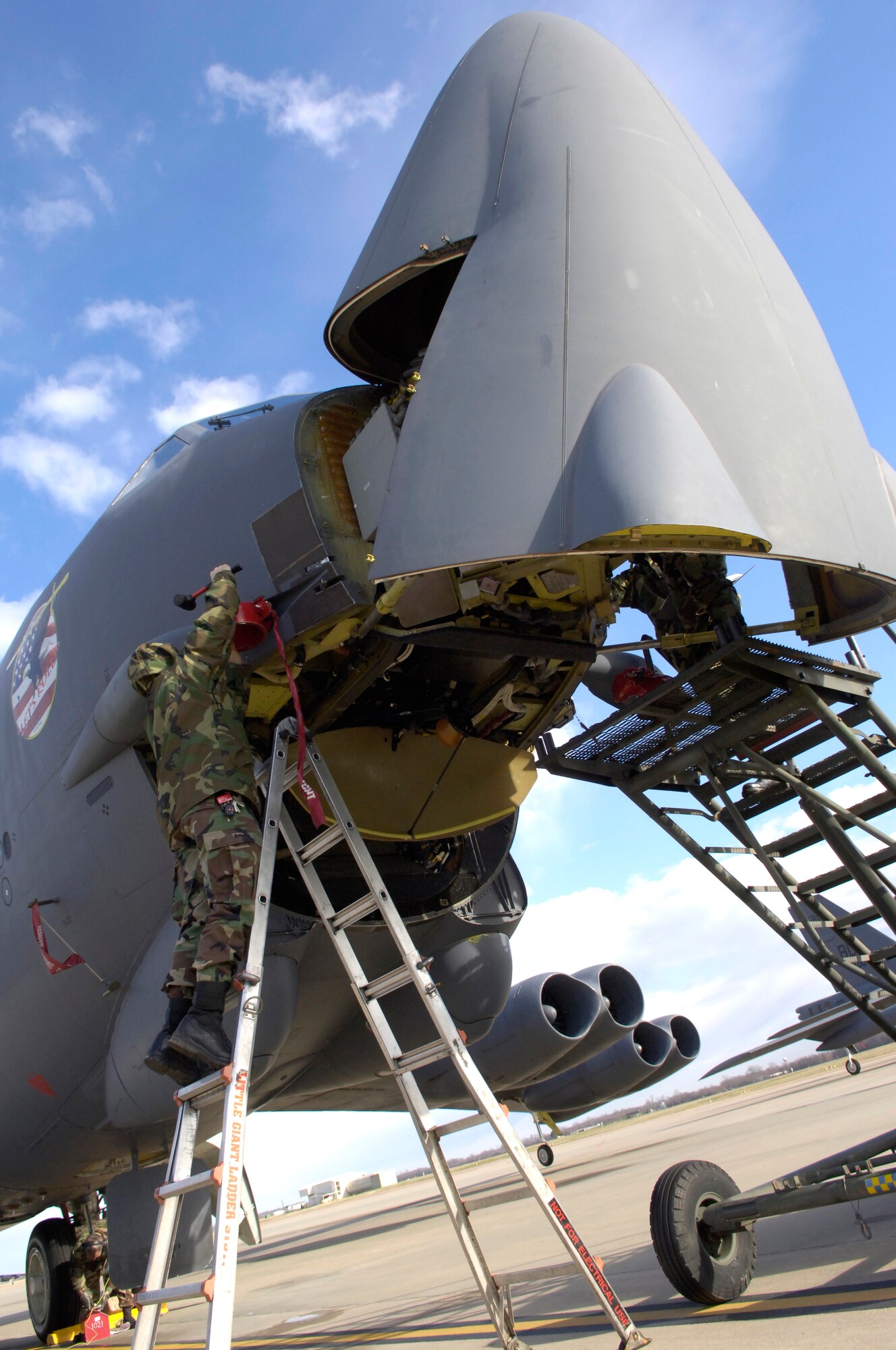 BARKSDALE AIR FORCE BASE, La. (AFPN) -- Staff Sgt. Randall Daniel performs maintenance on a B-52H Stratofortress Feb. 4.  Sergeant Daniel is a Reservist assigned to the 917th Aircraft Maintenance Squadron here. (U.S. Air Force photo by Senior Airman Brian Ferguson)