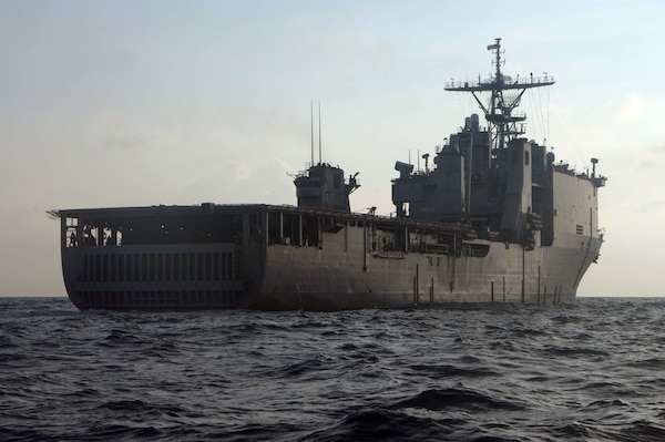 The amphibious dock landing ship USS Carter Hall maneuvers for a small boat operation as the Visit, Board, Search and Seizure team prepares to conduct a VBSS mission. Carter Hall is currently on a regularly scheduled deployment conducting maritime security operations. MSO set the conditions for security and stability in the maritime environment as well as complement the counter-terrorism and security efforts of regional nations.