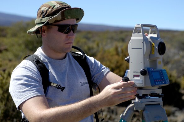 POHAKULOA TRAINING AREA, Hawaii (AFPN) -- Airman 1st Class Kent Perkins maps the location of evidence at a bomb scene scenario. The FBI, along with Army cadre, conducted a large vehicle post blast investigator's course here. It included instruction on investigative techniques and evidence collection. Airman Perkins is assigned to the 15th Civil Engineer Squadron explosive ordnance disposal flight at Hickam Air Force Base, Hawaii. (U.S. Air Force photo by Tech. Sgt. Shane A. Cuomo) 
