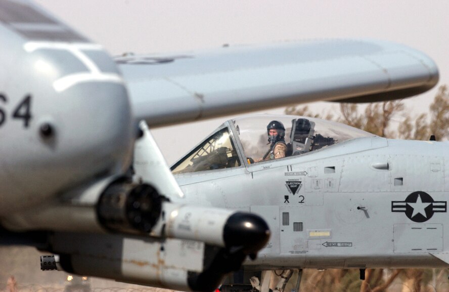 OPERATION IRAQI FREEDOM -- An A-10 Thunderbolt II pilot taxis into position for a "hot" refuel of his A-10.  This was the first A-10 hot refuel in Iraq and the first time the R-14 fuel hydrant system was used in the hot-refuel process.  The pilot and aircraft are with the 442nd Fighter Wing from Whiteman Air Force Base, Mo., which was deployed to Tallil and Kirkuk Air Bases in Iraq in 2003.  (U.S. Air Force photo by Master Sgt. Terry L. Blevins)