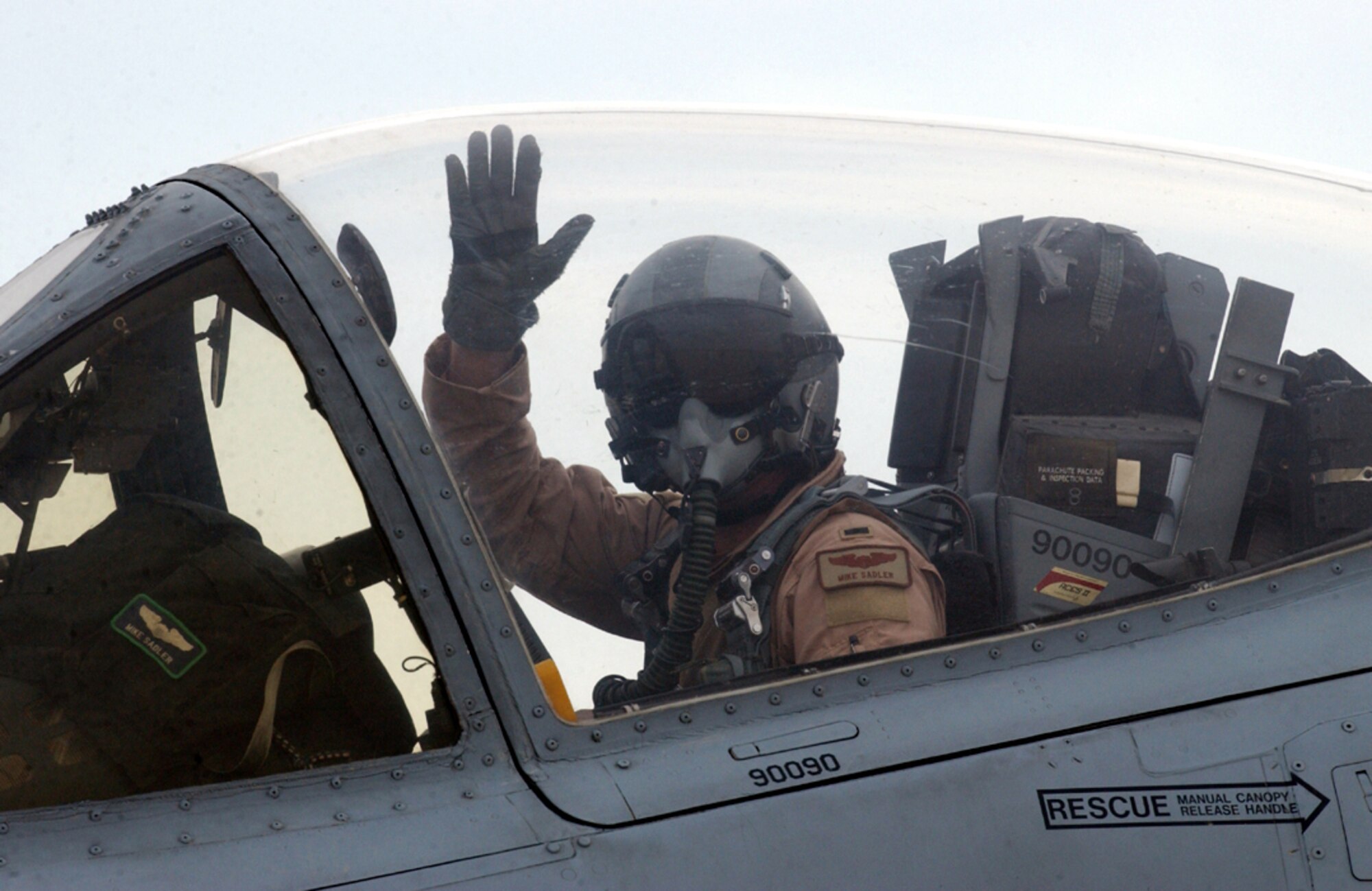 OPERATION IRAQI FREEDOM -- Then 1st Lt., now Capt. Mike Sadler, a pilot with the 442nd Fighter Wing, waves at his crew chief during his taxi to the runway to launch his A-10 on a combat mission over Iraq on April 18, 2003.  The 442nd is from Whiteman Air Force Base, Mo., and was deployed to Tallil and Kirkuk Air Bases in southern Iraq.   Air Force Reservists who were on this deployment were recently awarded the Air Force Outstanding Unit Award with a Valor Device. (U.S. Air Force photo by Master Sgt. Terry L. Blevins)