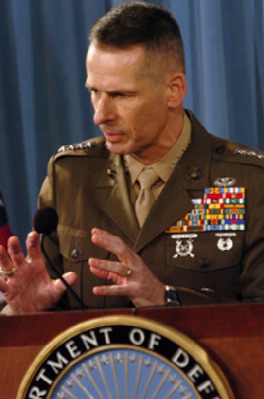 Chairman of the Joint Chiefs of Staff Gen. Peter Pace, U.S. Marine Corps, answers a question from a reporter during a press briefing on the Defense Department budget for fiscal year 2007 in the Pentagon on Feb. 6, 2006. Pace joined Secretary of Defense Donald H. Rumsfeld to present the major points of the budget to the press. 