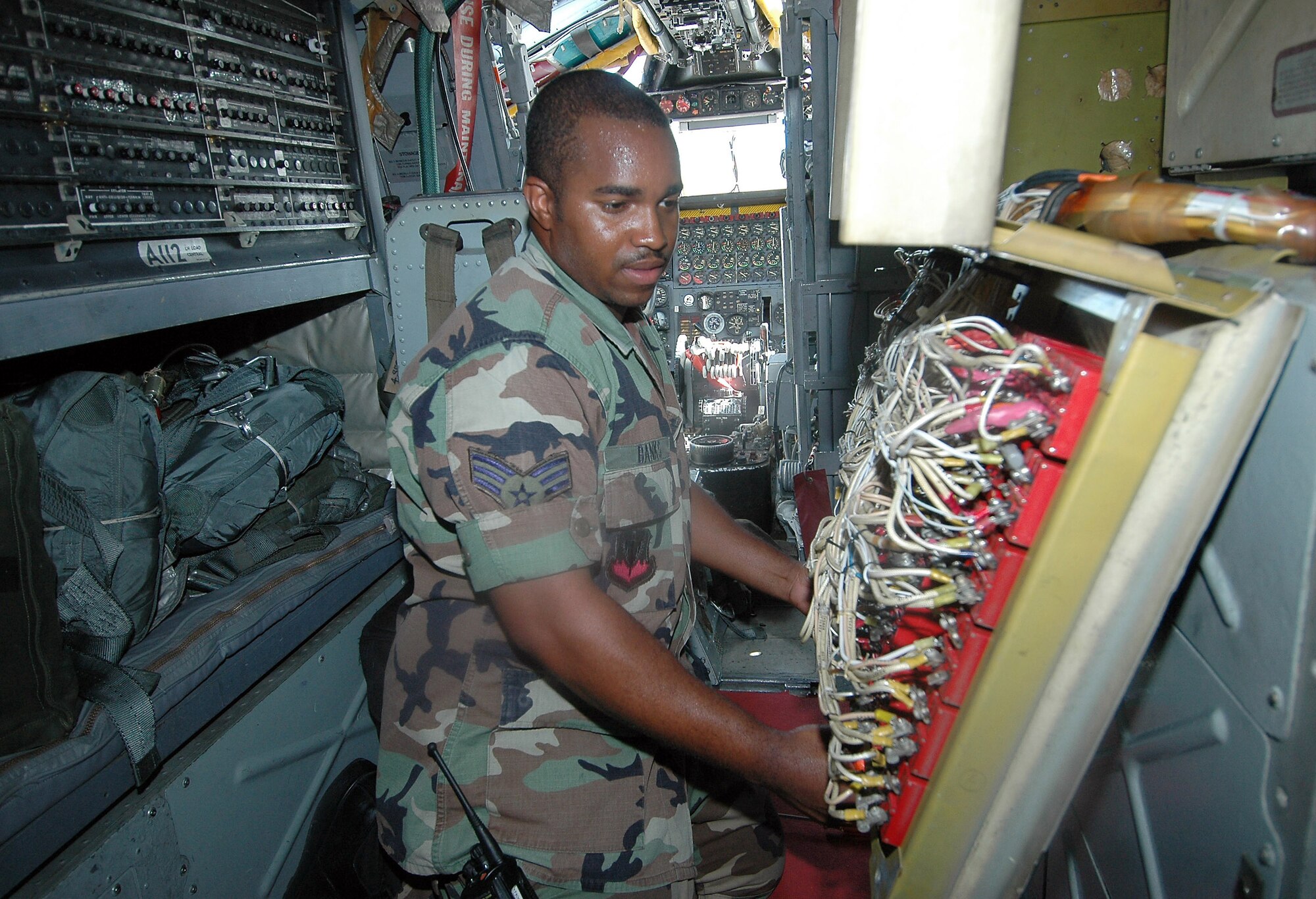 OPERATION ENDURING FREEDOM (AFPN) -- Senior Airman Kevin Banks inspects a fuse panel on a B-52 Stratofortress during routine maintenance. The B-52s join other U.S. and coalition aircraft over Afghanistan, providing close-air support in support of Operation Enduring Freedom. Airman Banks is deployed from Barksdale Air Force Base, La.  He is an electrical-environmental journeyman assigned to the 40th Expeditionary Maintenance Squadron. (U.S. Air Force photo by Staff Sgt. Doug Nicodemus)