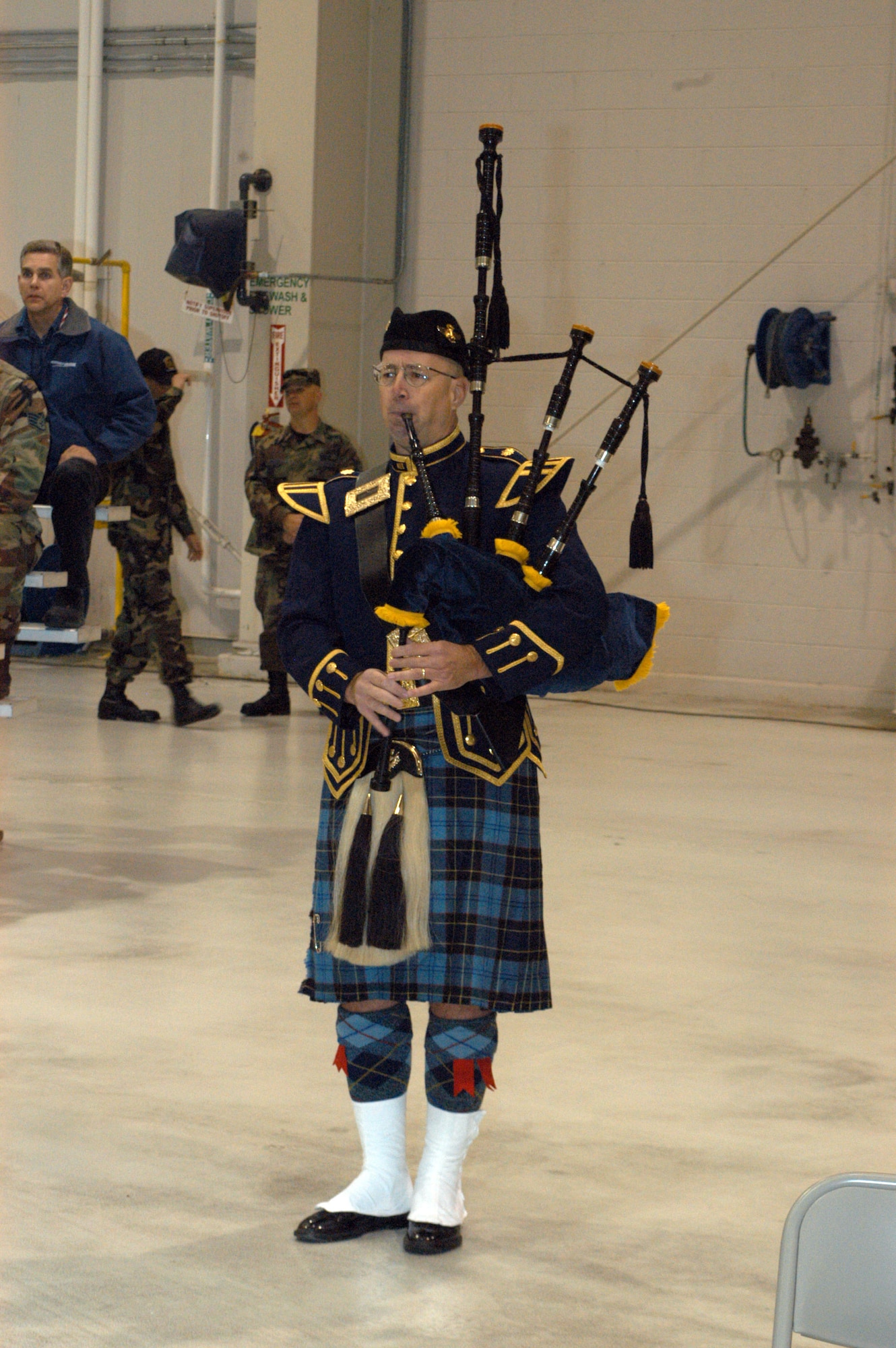 ROBINS AIR FORCE BASE, Ga. (AFPN) -- Lt. Col. Skip Blumenthal plays the bagpipes at the 116th Air Control Wing change of command ceremony in October. He is wearing the official Air Force Reserve tartan uniform. (U.S. Air Force photo by Master Sgt. Rick Cowan)