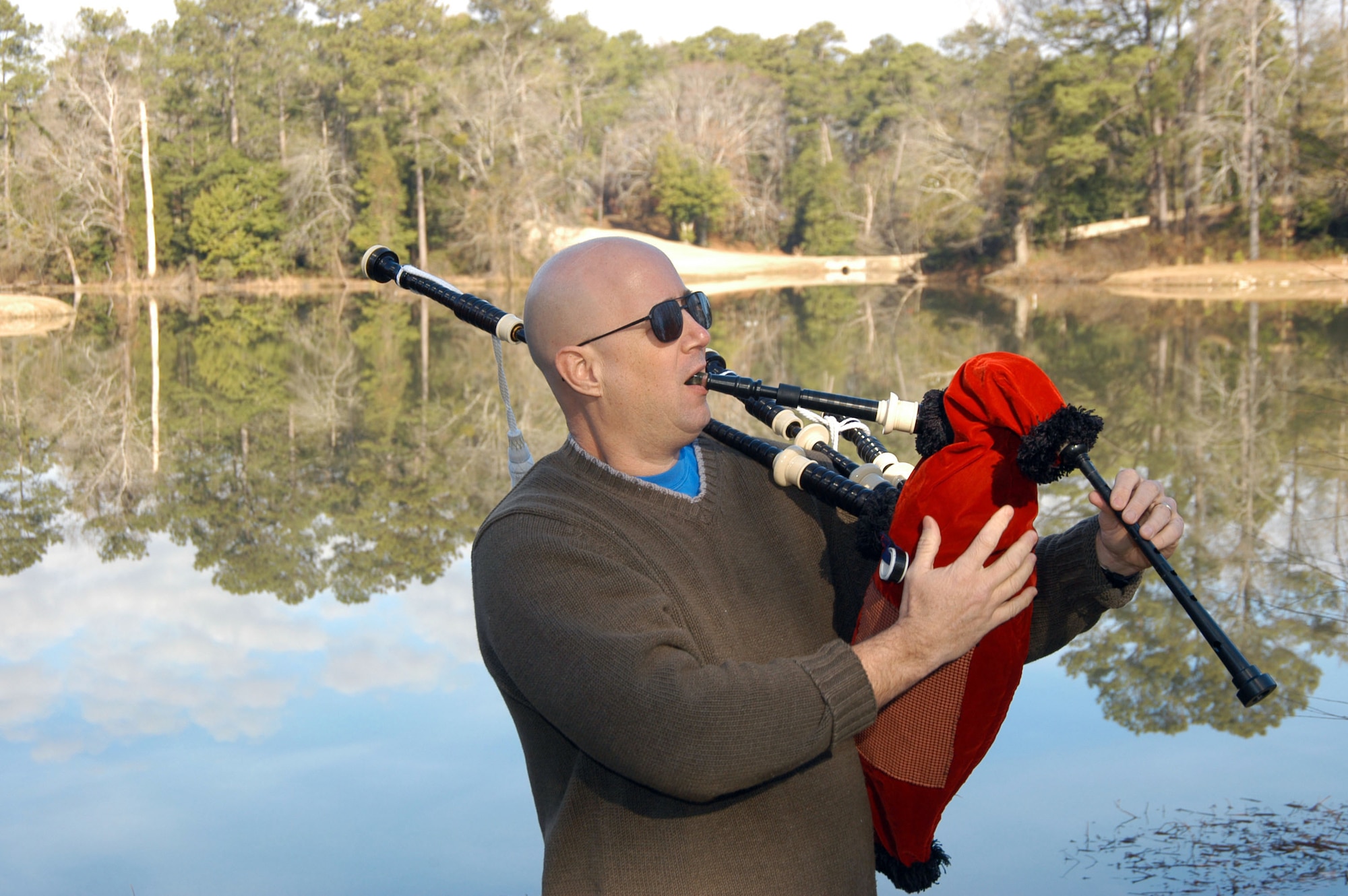 ROBINS AIR FORCE BASE, Ga. (AFPN) -- Lt. Col. Skip Blumenthal practices playing bagpipes at least half an hour four or five days a week, usually in his backyard. (U.S. Air Force photo by Tech. Sgt. Beverly Isik)