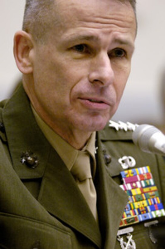 Chairman of the Joint Chiefs of Staff Gen. Peter Pace, U.S. Marine Corps, responds to a question from a committee member as he testifies before the House Armed Services Committee hearing at the Rayburn House Office Building in Washington, D.C., on Feb. 8, 2006. Pace joined Secretary of Defense Donald H. Rumsfeld and Chief of Staff of the U.S. Army Gen. Peter Schoomaker in testifying before the committee. 