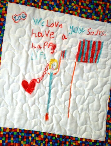 One square in a "Quilt of Valor" designed by first-grade children at Sangree Elementary School in Summerville, S.C.  Four quilts were presented to Chaplain (Maj.) John Painter, a reservist assigned to the 315th Airlift Wing at Charleston AFB, S.C.  Chaplain Painter accepted two quilts on behalf of his civilian employer the Ralph H. Johnson VA Medical Center and two quilts that will be delivered by the 315th Airlift Wing to a regional hospital in Germany. (Photo by Tech. Sgt. Mark Kleber, USAFR)