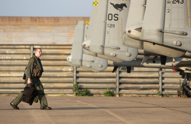 KORAT ROYAL AIR FORCE BASE, Thailand (AFPN) -- Maj. Chris Price walks to his A-10 Thunderbolt II before an exercise Cope Tiger '06 mission here Feb. 8. Major Price is an A-10 pilot with the 25th Fighter Squadron at Osan Air Base, South Korea.  (U.S. Air Force photo by Tech. Sgt. Keith Brown) 

