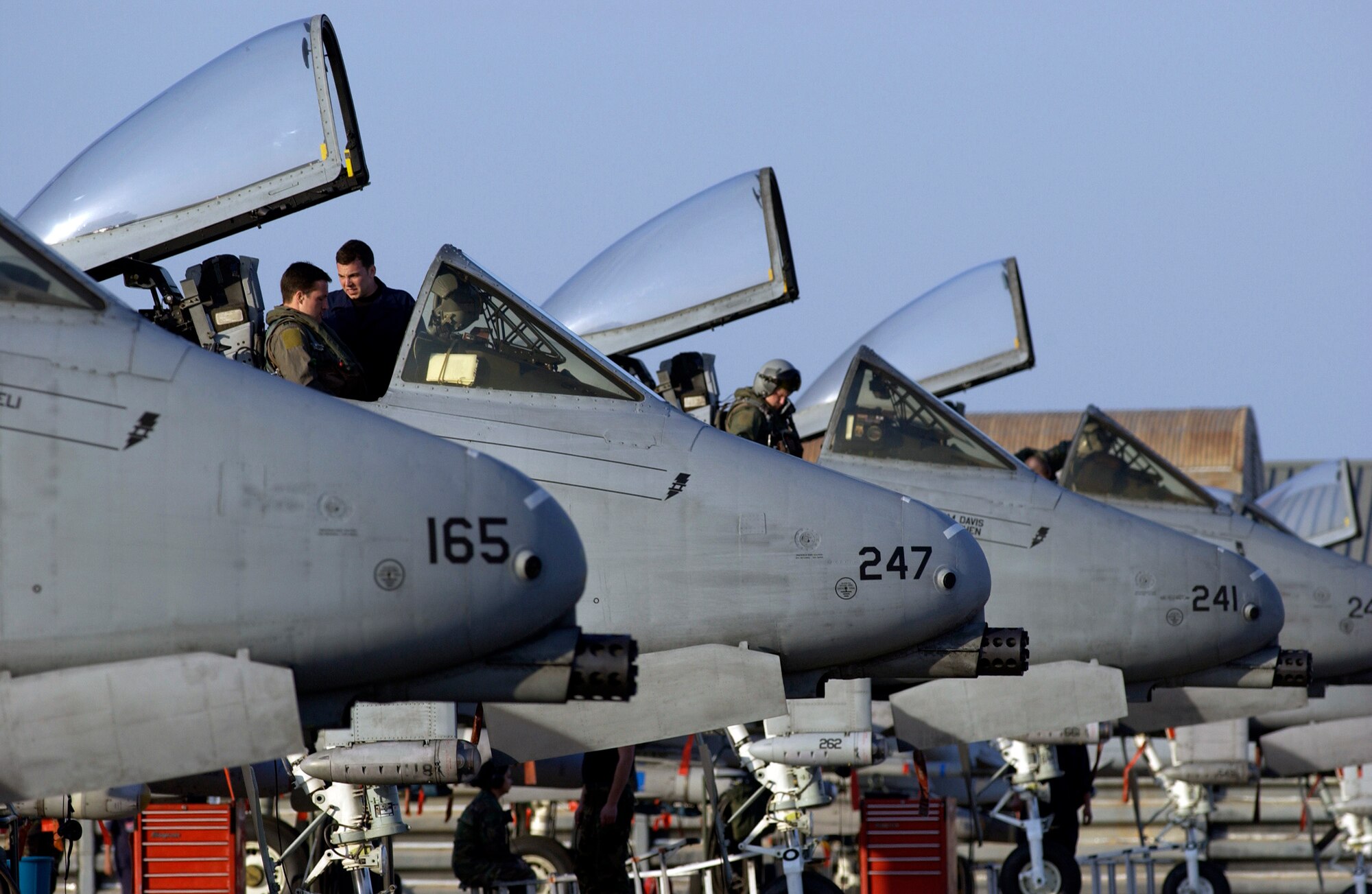 KORAT ROYAL AIR FORCE BASE, Thailand (AFPN) -- Aircrews from the 25th Fighter Squadron perform pre-flight procedures during an exercise Cope Tiger '06 mission here Feb. 8. The crews are some of the 300 U.S. servicemembers participating in the exercise here, about 110 miles northeast of Bangkok. An additional 1,000 Thai and Singaporean forces are participating in the exercise. Cope Tiger '06 provides air-to-air, air-to-ground and large force employment training for crews while expanding the capabilities and readiness of U.S. and allied forces. Cope Tiger '06 runs through Feb. 18. (U.S. Air Force photo by Tech. Sgt. Keith Brown) 

