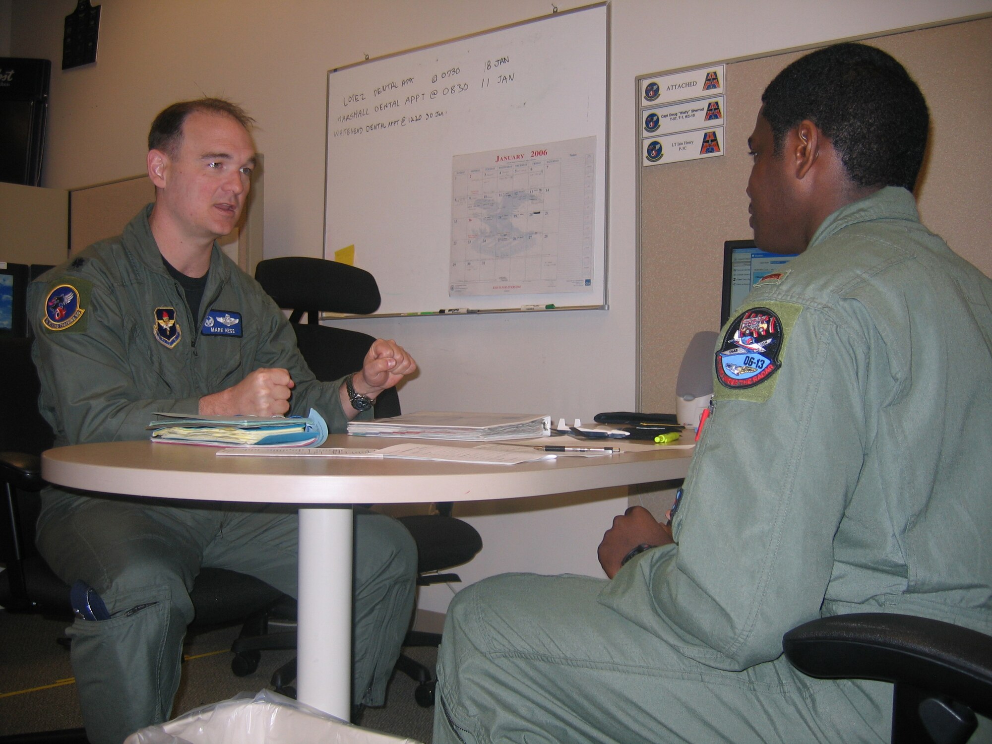 MOODY AIR FORCE BASE, Ga. - Lt. Col. Mark Hess, 3rd Flying Training Squadron commander, briefs 2nd Lt. Paul Lopez prior to a flight Jan. 17. Colonel Hess made history Jan. 19 by becoming the first Air Education and Training Command squadron commander to attain 1,000 flying hours in the T-6A Texan II. (Photo by Senior Airman S.I. Fielder)