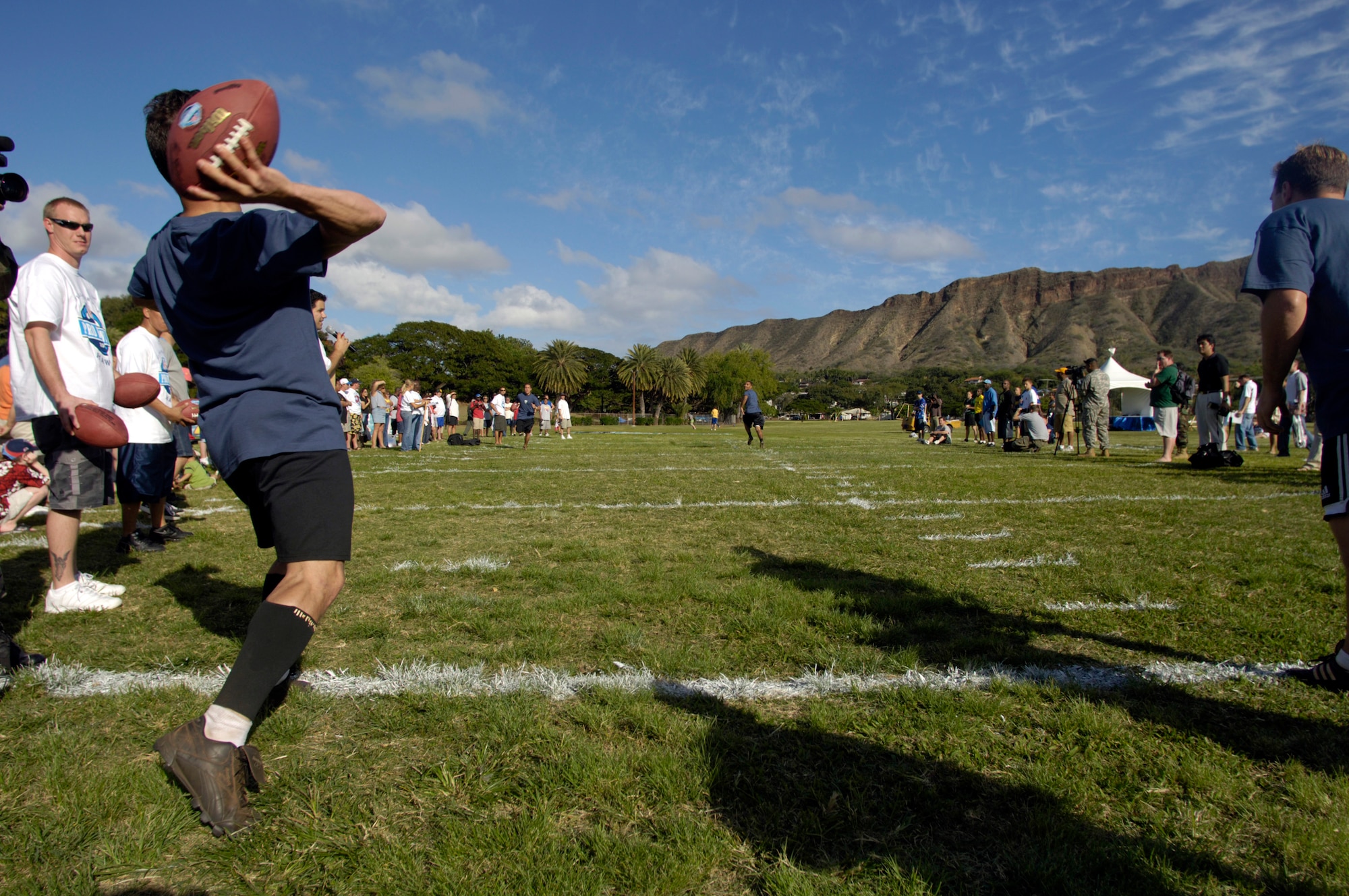 KAPIOLANI PARK, Hawaii (AFPN) -- Claude Jennings launches a pass during the National Football League Military Challenge. Jennings made 10 consecutive maximum-point completions to his five teammates ensuring the Air Force took top honors. Each service competed in punt, pass, snapping and kicking competitions. (U.S. Air Force photo by Tech. Sgt. Shane Cuomo) 