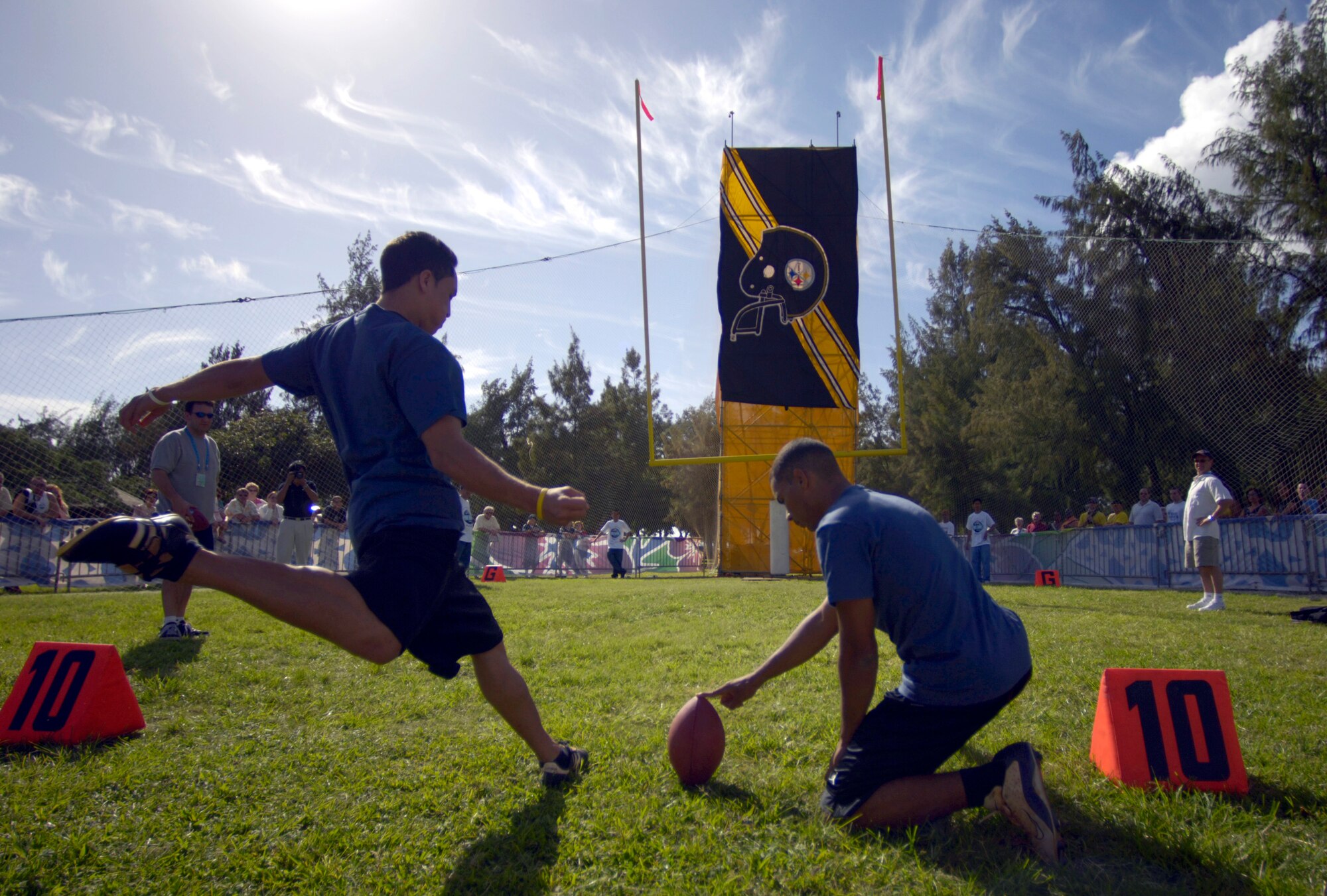 KAPIOLANI PARK, Hawaii (AFPN) -- Ryan McGovern attempts another field goal during National Football League Military Challenge. Each service competed in punt, pass, snapping and kicking competitions. (U.S. Air Force photo by Tech. Sgt. Shane Cuomo) 
