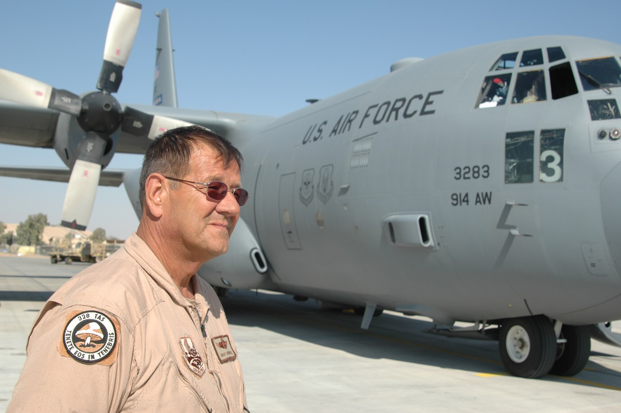 BALAD AB, IRAQ- Senior Master Sgt. Eugene Busch, 746th Expeditionary Airlift Squadron, Flight Engineer  stands in front of C-130H aircraft at Balad Air Base while waiting for cargo to be uploaded.
(Air Force photo by Master Sgt. Peter Borys) (Released) 