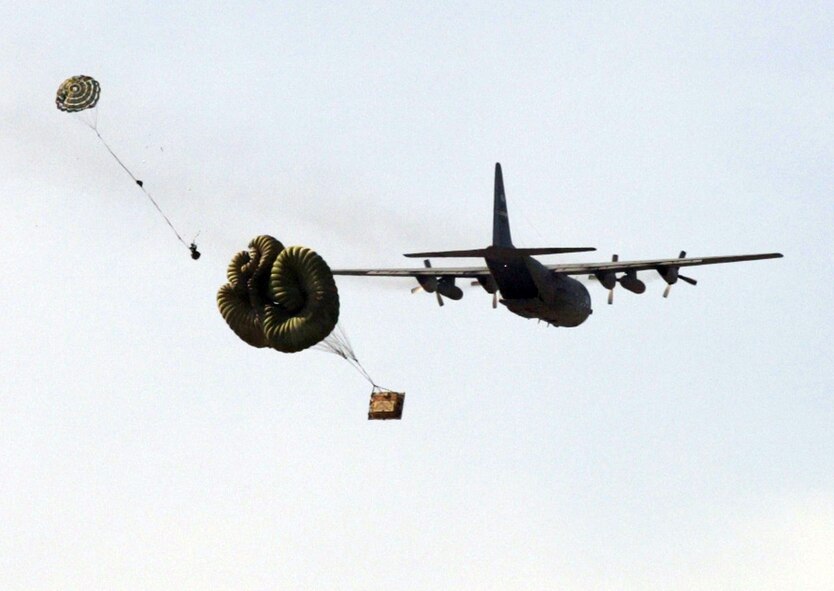 DOBBINS AIR RESERVE BASE, Ga. -- A Dobbins C-130H performs and air drop over the Dobbins airfield.