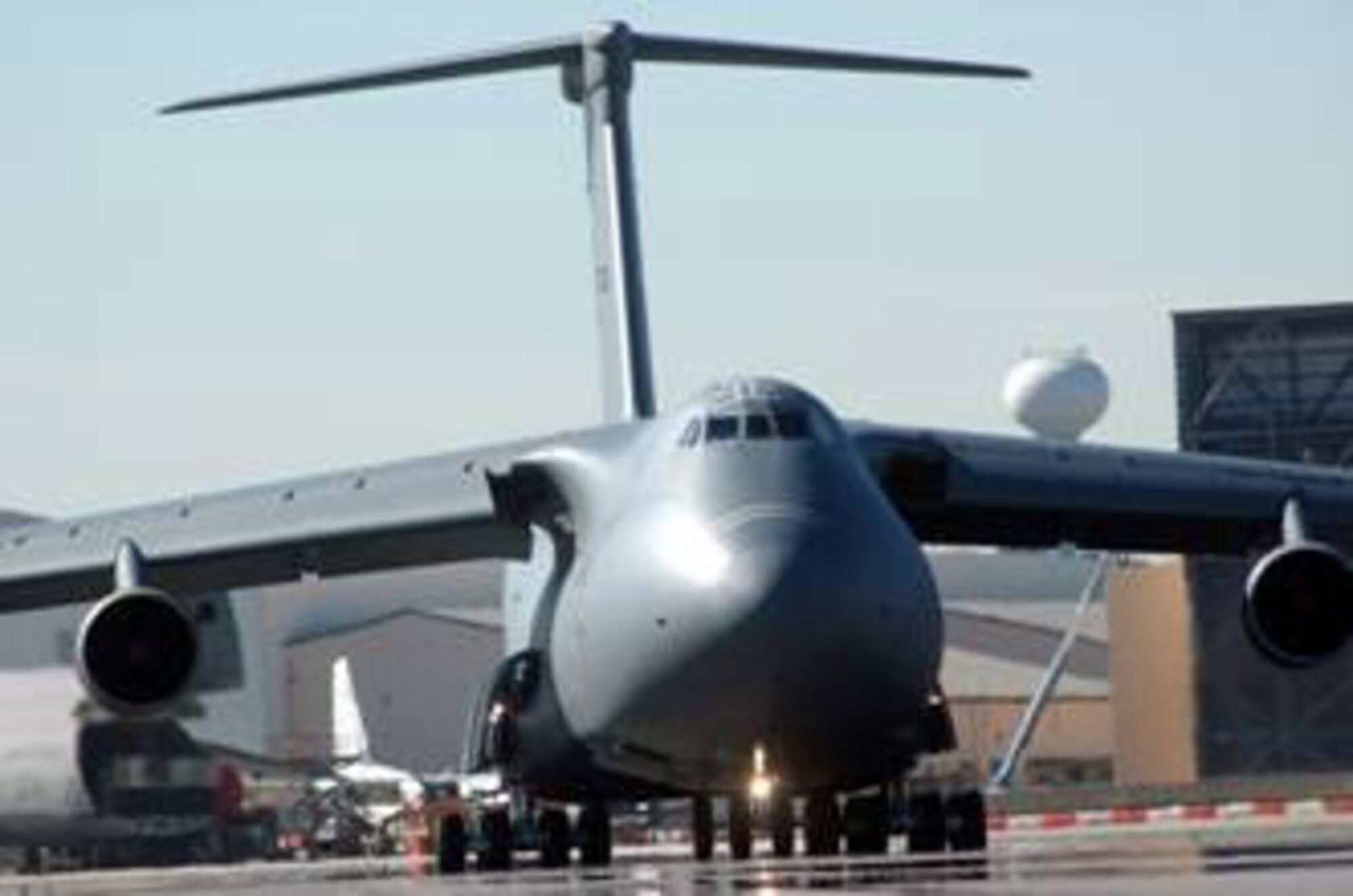 ROBINS AIR FORCE BASE, Ga. (AFMCNS)- A C-5B Galaxy, aircraft 87040, taxis onto Robins' runway on its way to Travis Air Force Base, Calif., after completing a record-low 159 days in programmed depot maintenance. (Air Force photo by Sue Sapp)


