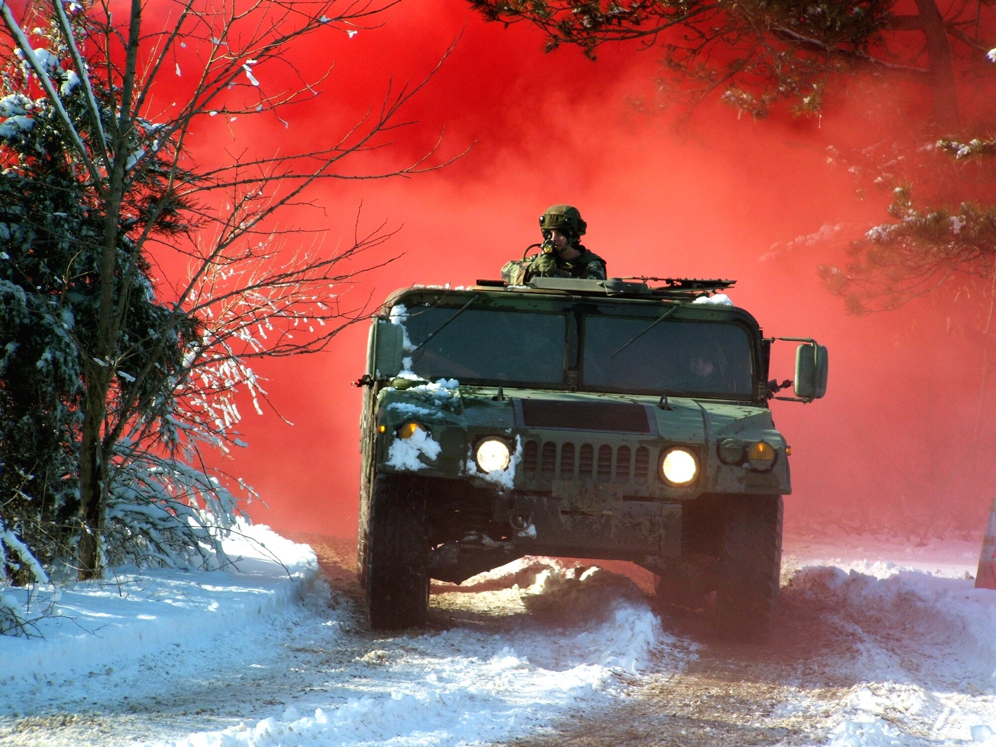 FORT DIX, N.J. (AFPN) -- Airmen respond to an "ambush" during a convoy training session here. The training is part of the Air Force Integrated Contingency Skills Training Course.  More than 80 Airmen are in the course, which is taught by the Air Mobility Warfare Center's 421st Combat Training Squadron.  Instruction also includes combat tactics and first aid. (U.S. Air Force photo by Tech. Sgt. Scott T. Sturkol)