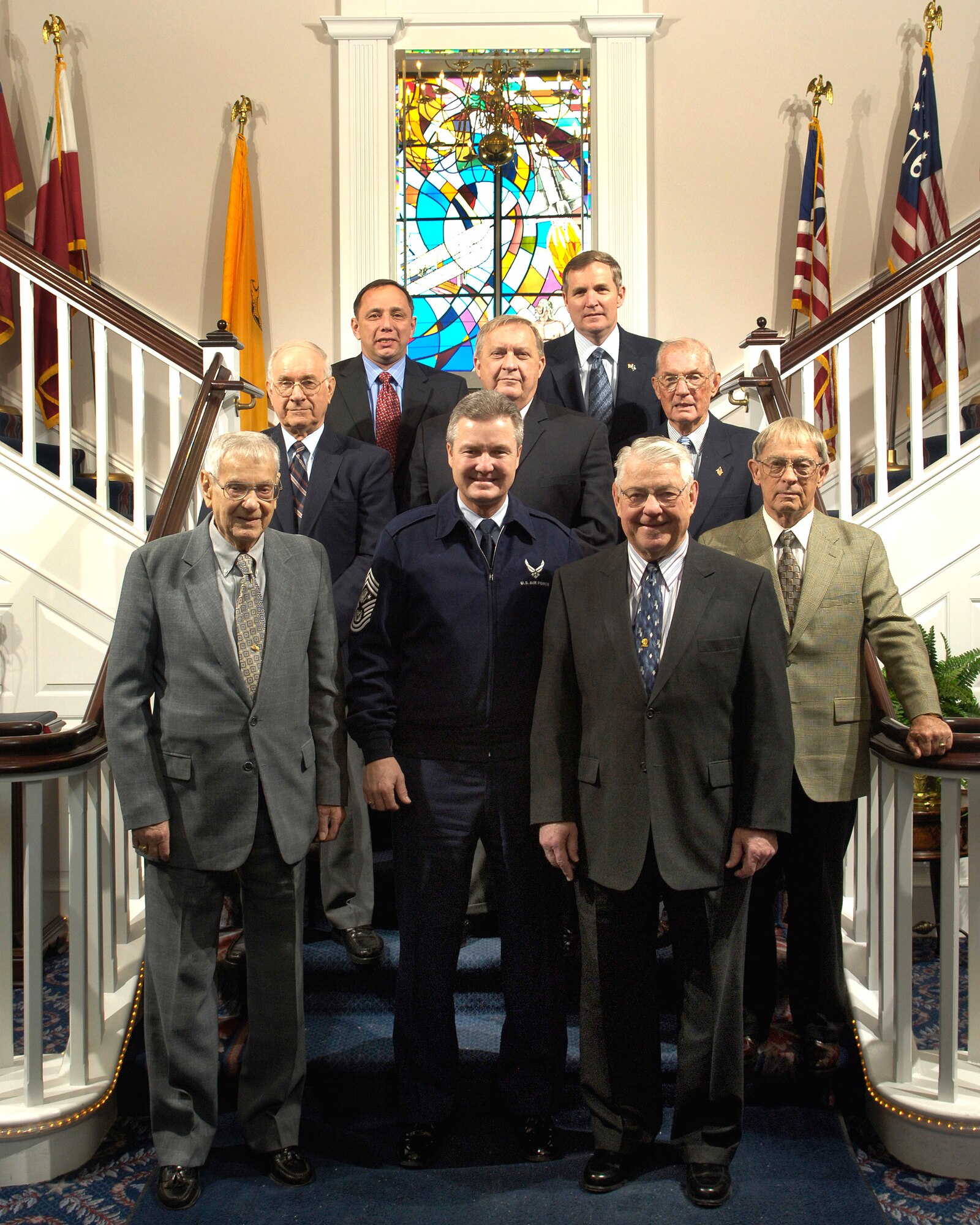 WASHINGTON (AFPN) -- Former Chief Master Sergeants of the Air Force pose for a group photo before meeting with enlisted members of the National Capital Region at Bolling Air Force Base, Washington, D.C., Feb. 14. From the left, front row, are Paul W. Airey, Gerald R. Murray, Robert D. Gaylor, Gary R. Pfingston, Sam E. Parish, James C. Binnicker, James M. McCoy, Frederick J. Finch and Eric W. Benken. Eight of the 13 former chiefs are meeting this week in the Pentagon with Chief Murray, who is the 14th chief master sergeant of the Air Force. (U.S. Air Force photo by Senior Airman Daniel R. DeCook) 
