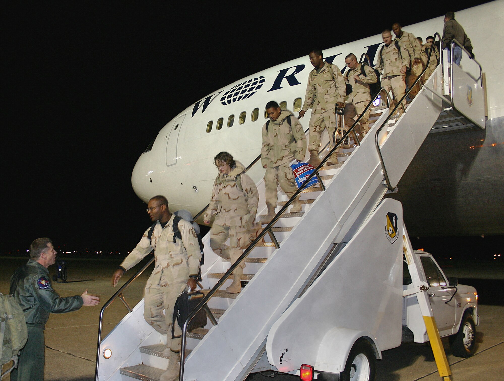 CANNON AIR FORCE BASE, N.M.--More than 100 Cannon Airmen returned Jan. 25 following a four-month Air and Space Expeditionary Force rotation to Iraq. They were greeted by base leadership and a large group of friends and family. (U.S. Air Force photo by Airman Thomas R. Trower)