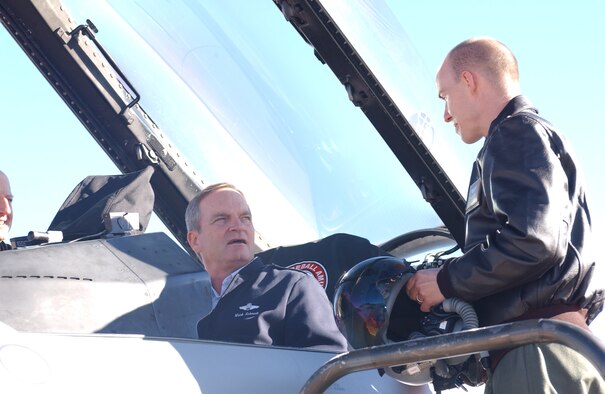 CANNON AIR FORCE BASE, N.M. -- First Lt. Sean McGoffin shows Lt. Gen. Mark Schmidt, 12th Air Force commander, the new Common Configuration Implementation Program upgrades to the 522nd Fighter Squadron Block 50 F-16s during Gen. Schmidt's visit to Cannon Feb. 1. (U.S. Air Force photo by Tech. Sgt. Scott Mackay)        