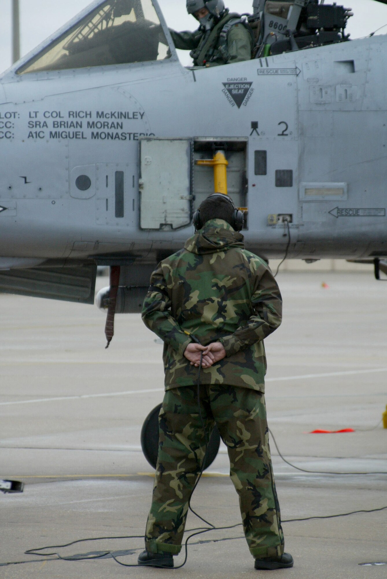 POPE AIR FORCE BASE, N.C. (AFPN) -- Senior Airman Brian Moran waits for the pilot to complete pre-flight procedures before launching an A-10 Thunderbolt II. Airman Moran is a crew chief with the 23rd Aircraft Maintenance Squadron. (U.S. Air Force photo by Lisa Terry McKeown) 
