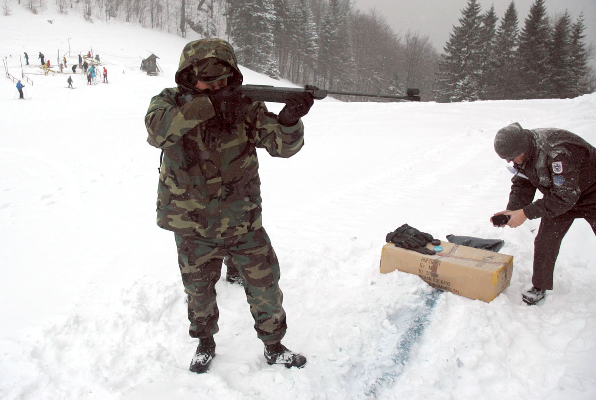 TUZLA AIR BASE, Bosnia and Herzegovina (AFPN) -- Lt. Col. David Lowe takes some practice shots before competing in Operation Winter Games. Colonel Lowe is commander of Detachment 1, 401st Air Expeditionary Wing. (U.S. Air Force photo by Master Sgt. Chance Babin) 
