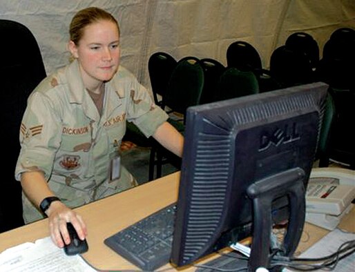 Senior Airman Helen Dickinson, a Reservist with the 446th Mission Support Squadron, is deployed to Southwest Asia with the 379th Exepditionary Logistics Readiness Squadron. She porvides briefings on standing orders and ground rules for servicemembers entering and leaving Iraq and Afghanistan. (U.S. Air Force photo by Maj. Anne Knabe)