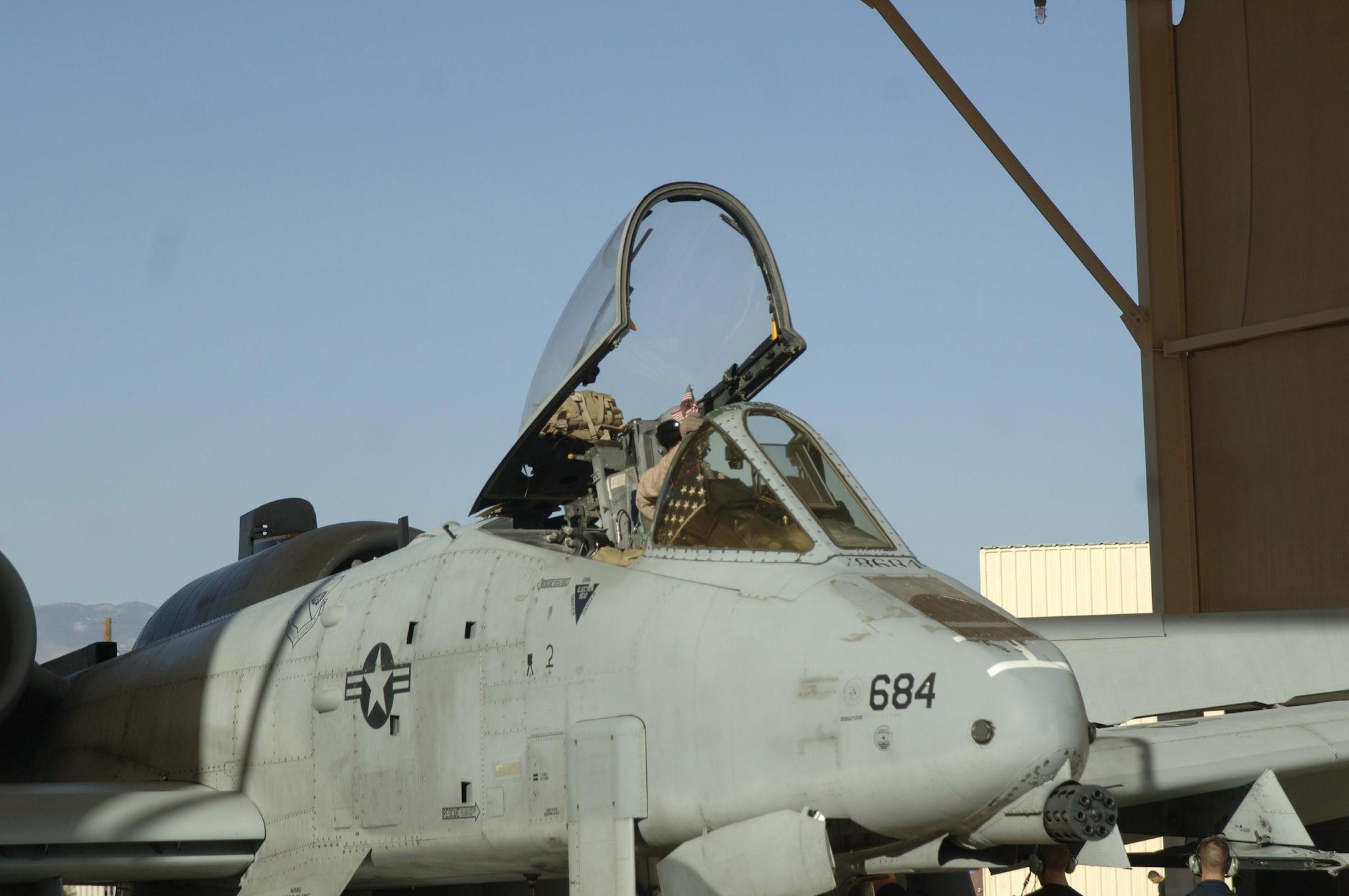 DAVIS-MONTHAN AIR FORCE BASE, Ariz. (AFPN) -- Capt. Jay Annis prepares to disembark his A-10 Thunderbolt II Feb. 10. Captain Annis, assigned to the 354th Fighter Squadron, was deployed to Bagram Air Base, Afghanistan, in support of Operation Enduring Freedom. (U.S Air Force photo by Airman 1st Class Christina D. Ponte)
