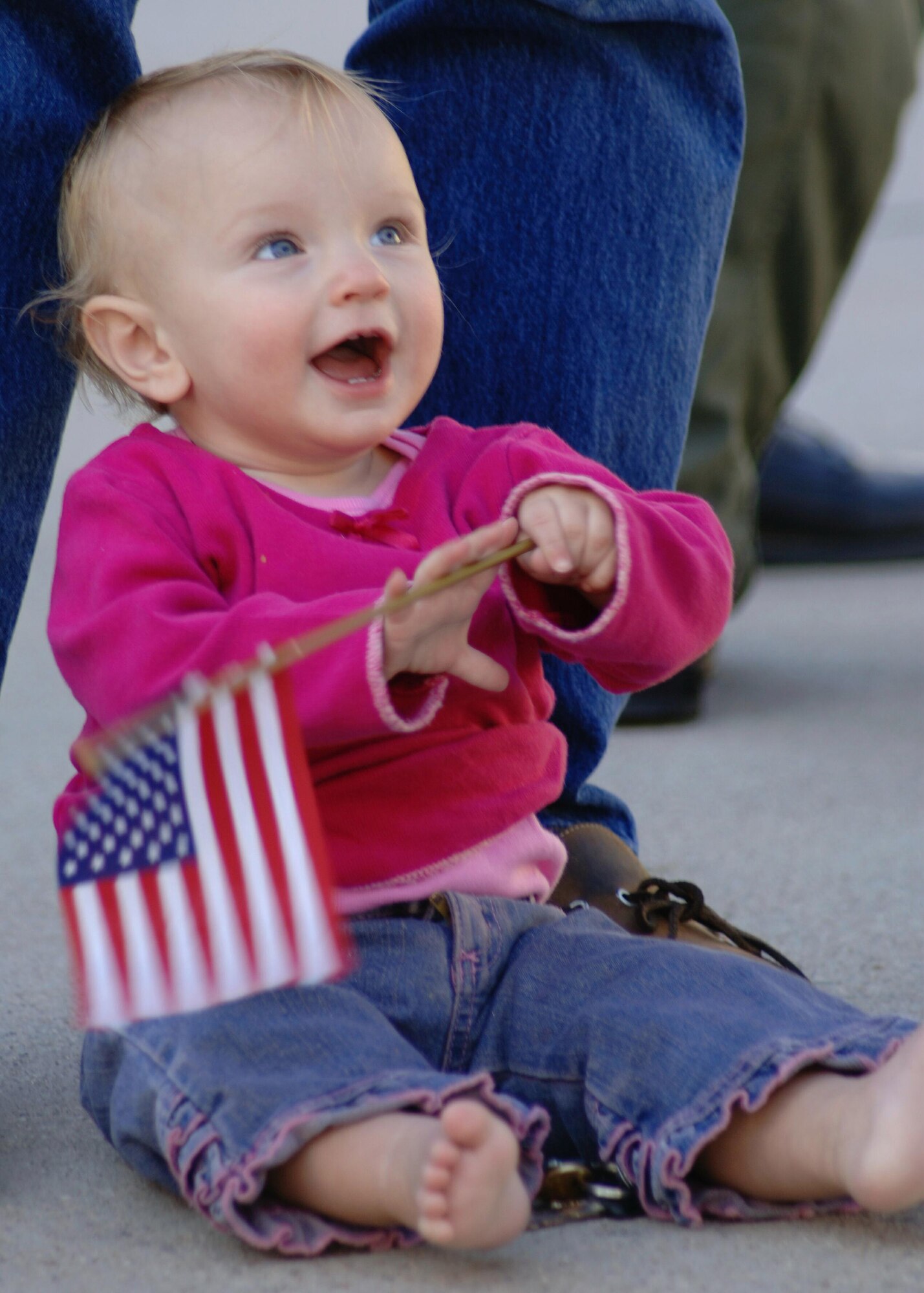 DAVIS-MONTHAN AIR FORCE BASE, Ariz. (AFPN) -- Razzie Raspet, daughter of Lynne and Capt. Steve Raspet, awaits her father's return Feb. 10. Captain Raspet, assigned to the 354th Fighter Squadron, was deployed to Bagram Air Base, Afghanistan, in support of Operation Enduring Freedom. (U.S Air Force photo by Airman 1st Class Christina D. Ponte)