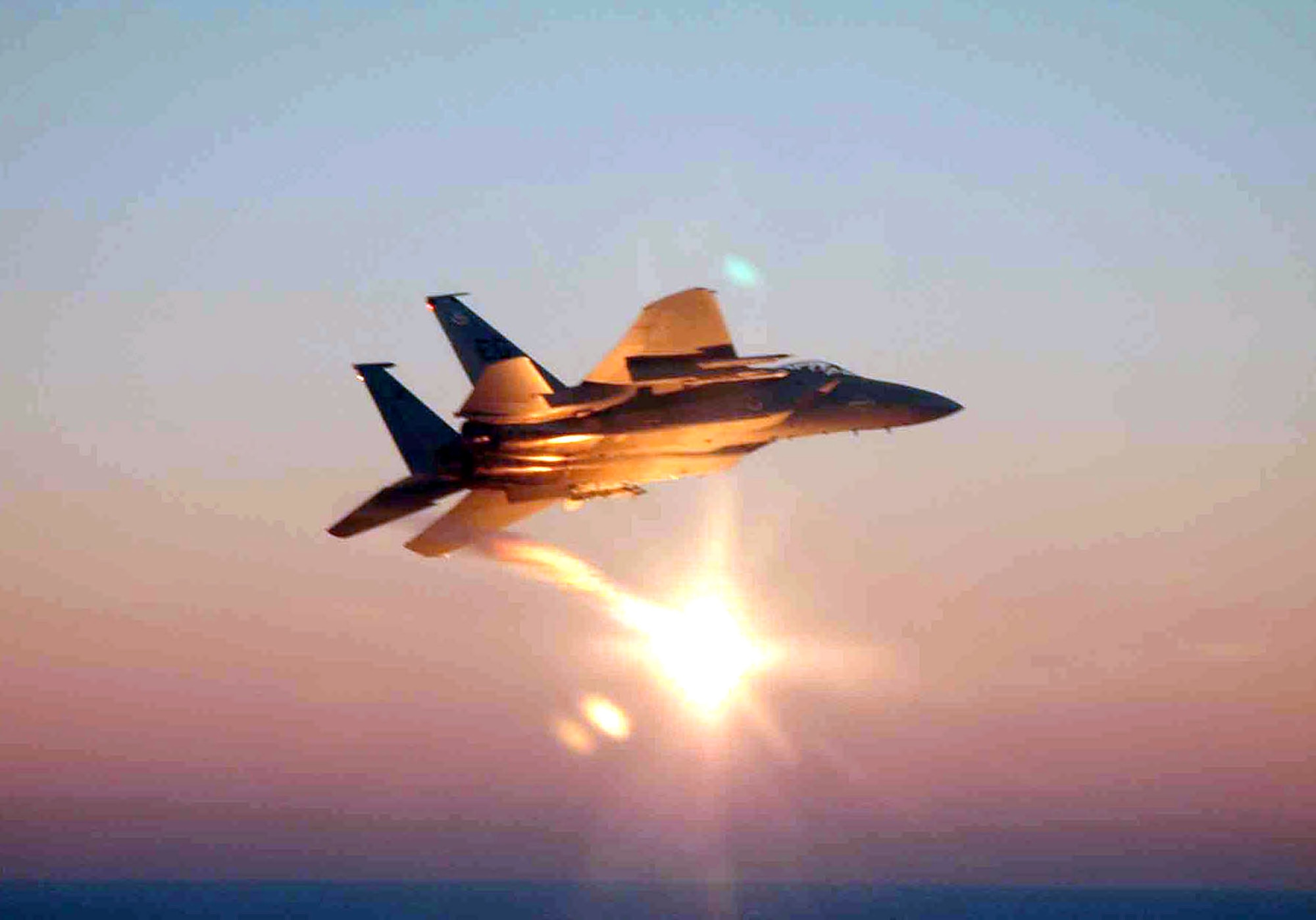 OPERATION NOBLE EAGLE (AFPN) -- An F-15C Eagle shoots off flares during a training mission Feb. 7.  The flares alert civilian aircraft that they are in restricted airspace.  The 33rd Fighter Wing has been supporting Operation Noble Eagle since Sept. 11, 2001, (U.S. Air Force Photo by Capt. Kristi Beckman)