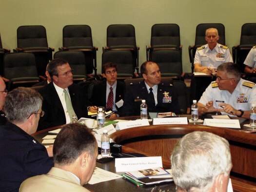 Florida military intallation commanders briefed Gov. Jeb Bush, center-left, on lesson learned from the 2005 hurricane season, family support issues, the impact of BRAC and the needs of their individual bases Feb. 10 at Homestead Air Reserve Base, Fla. The Florida Commanders' Meeting is a bi-annual confrence providing a venue for mililtary leaders to discuss how the state can provide support to service members and their missions.  (US Air Force Reserve photo by Dan Galindo)                               
