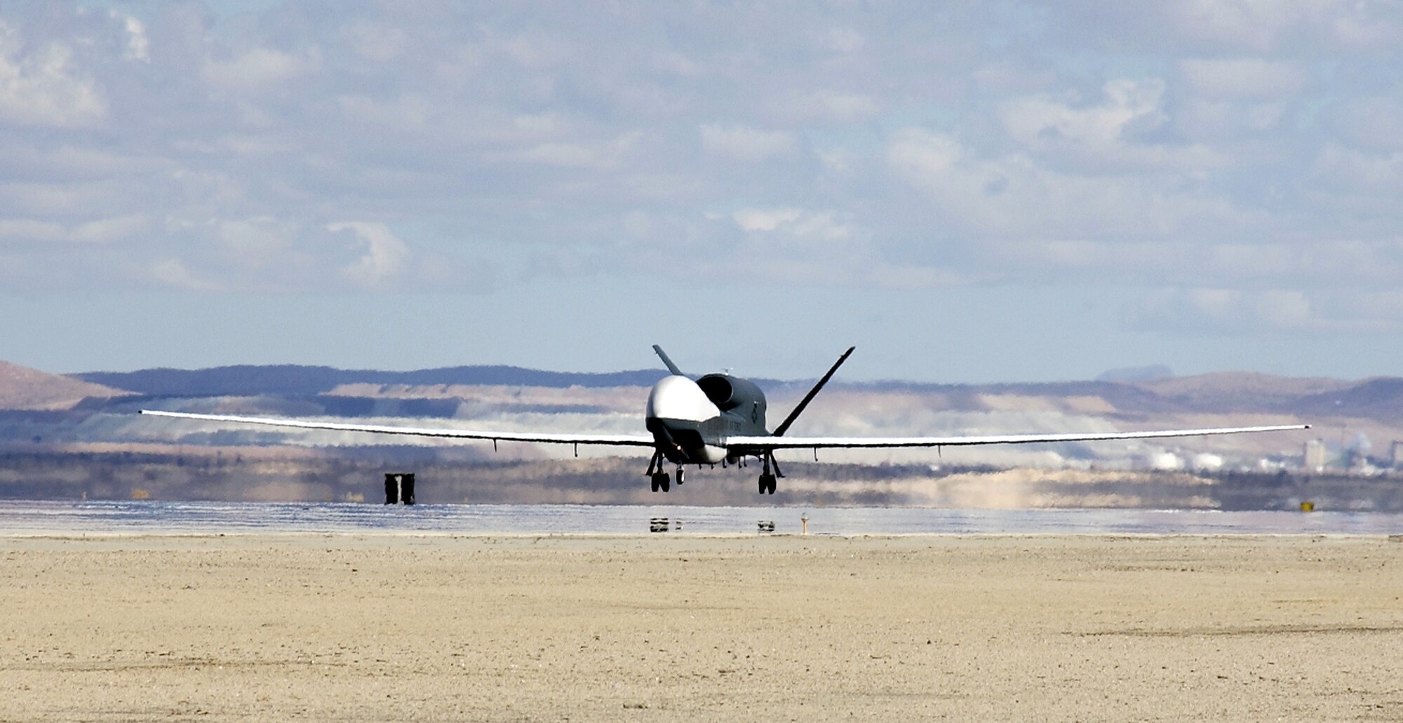 EDWARDS AIR FORCE BASE, Calif. -- After supporting the Global War on Terror for three years, Global Hawk unmanned aerial vehicle number three (UAV-3) received its official homecoming today when its wheels touched down at 11:30 a.m. Pacific Time at Edwards Air Force Base, Calif. (U. S. Air Force photo by Chad Bellay)